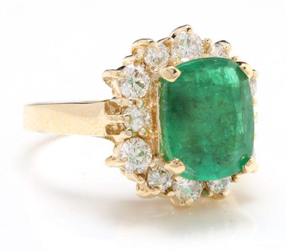 4.50 Carats Natural Emerald and Diamond 14K Solid Yellow Gold Ring

Total Natural Cushion Cut Emerald Weight is: Approx. 3.20 Carats (transparent )

Emerald Measures: Approx. 9.86mm x 7.90mm

Emerald Treatment: Oiling

Natural Round Diamonds Weight: