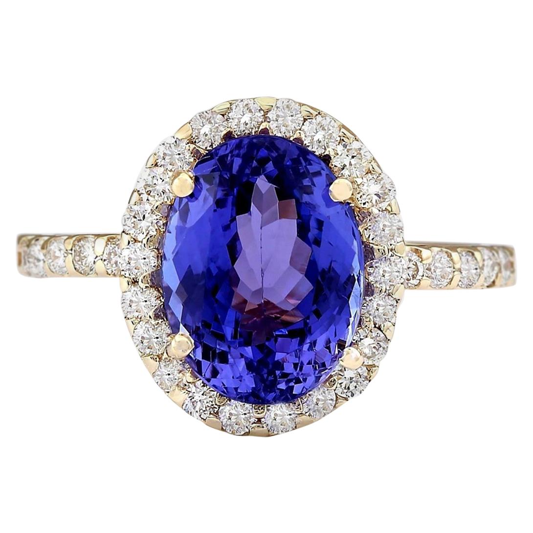 Natural Tanzanite Diamond Ring In 14 Karat Yellow Gold  For Sale