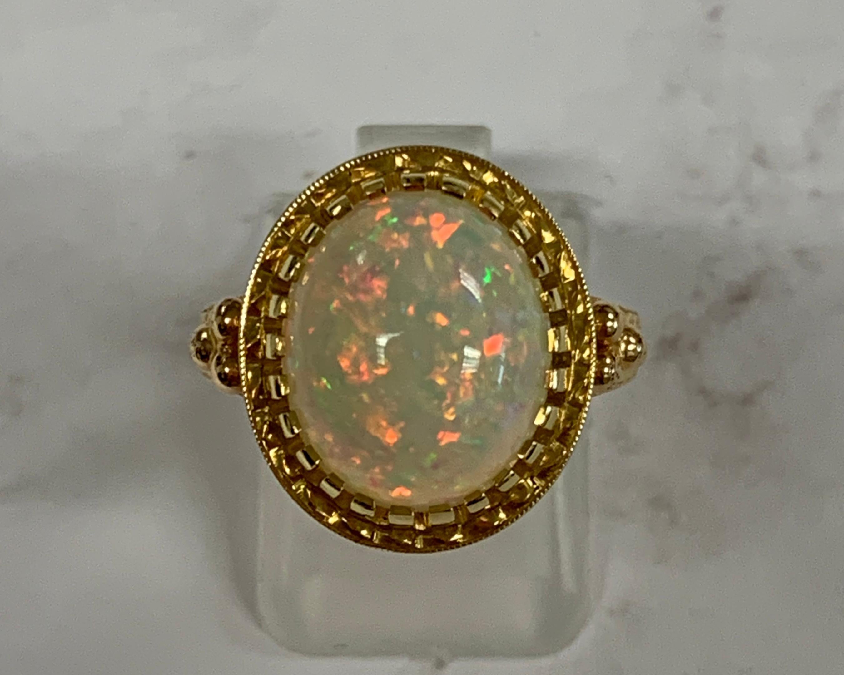 Artisan 4.30 Carat Opal in Handmade 18k Yellow Gold Ring For Sale