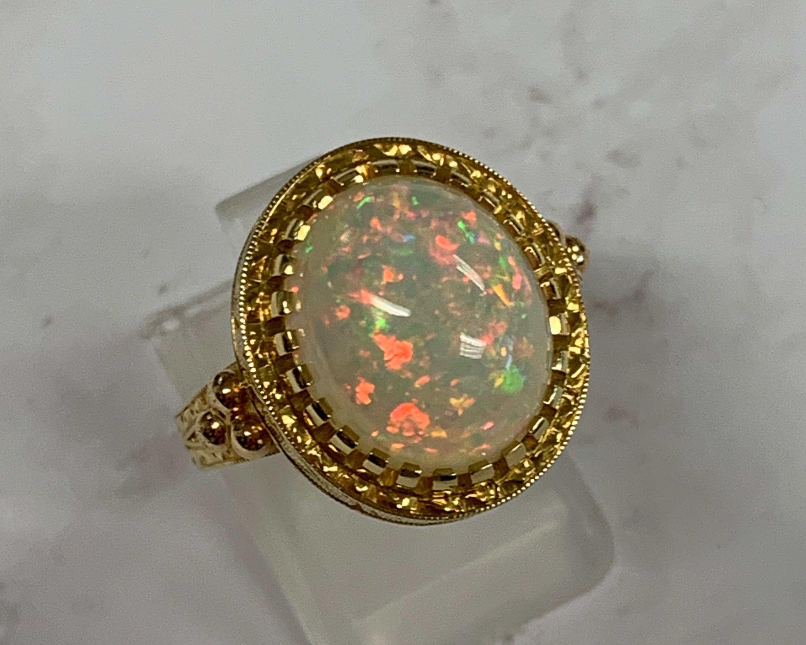 Cabochon 4.30 Carat Opal in Handmade 18k Yellow Gold Ring For Sale