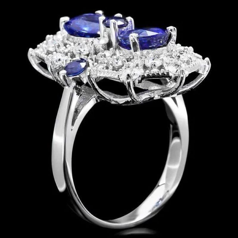 4.30 Carats Natural Blue Sapphire and Diamond 14K Solid White Gold Ring

Total Blue Sapphire Weight is: Approx. 3.40 Carats

Sapphire Measures: Approx. 8.00 x 6.00mm (2 Pear)

Sapphire Measures: Approx. 3 mm (3 Round)

Sapphire treatment: