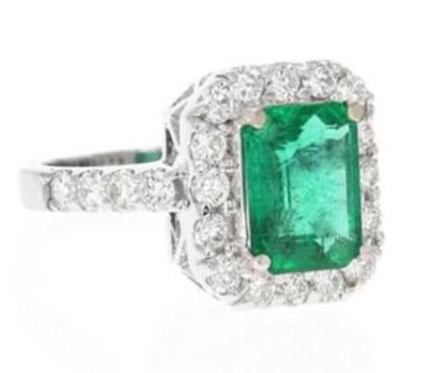4.30 Carats Natural Emerald and Diamond 14K Solid White Gold Ring

Total Natural Green Emerald Weight is: Approx. 3.00 Carats (transparent)

Emerald Measures: Approx. 9 x 7mm

Emerald Treatment: Oiling

Natural Round Diamonds Weight: Approx. 1.30
