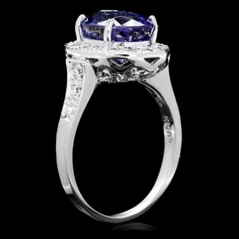 4.30 Carats Natural Tanzanite and Diamond 14K Solid White Gold Ring

Total Natural Oval Tanzanite Weight is: Approx. 3.90 Carats 

Tanzanite Measures: Approx. 10.00 x 8.00mm

Natural Round Diamonds Weight: Approx. 0.40 Carats (color G-H / Clarity