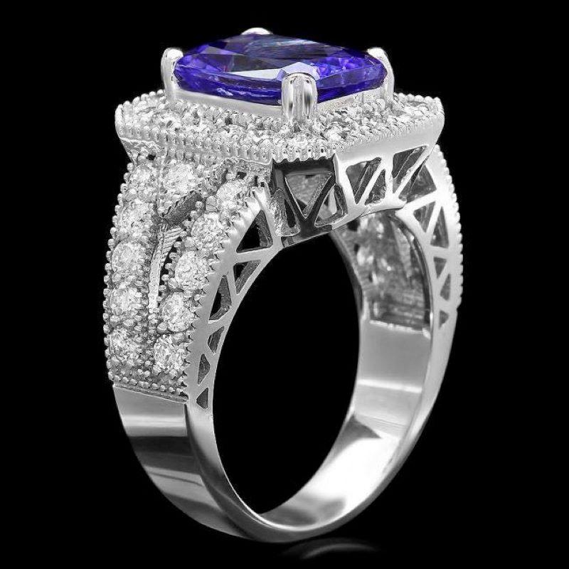 4.bague en or blanc massif 14K avec tanzanite naturelle de 30 carats et diamant

Le poids total de la tanzanite naturelle est de : Environ 2,90 carats 

Mesures de la tanzanite : Environ 10.00 x 7.00mm

Diamants ronds naturels Poids : Environ 1,40