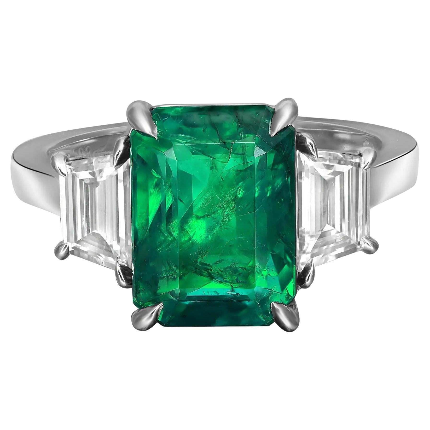 4.30 Carats Octagonal Zambian Green Emerald & Diamond Engagement Ring Platinum For Sale