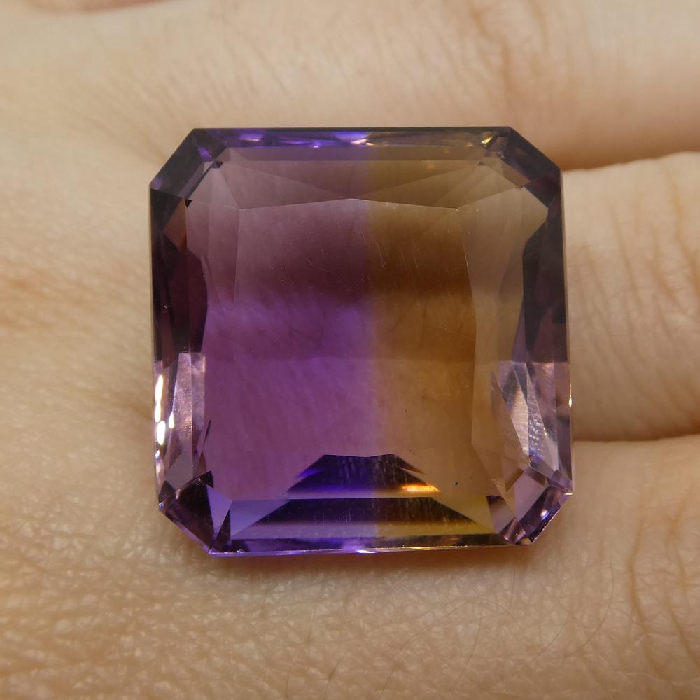 Description:

Gem Type: Ametrine
Number of Stones: 1
Weight: 43.02 cts
Measurements: 21.30x20.80x11.80 mm
Shape: Square
Cutting Style Crown: Step Cut
Cutting Style Pavilion: Mixed Cut
Transparency: Transparent
Clarity: Very Slightly Included: Eye