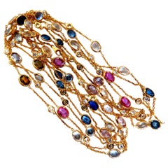 Collier « Yard » de 43,05 carats, composé de saphirs naturels aux couleurs vives et de diamants, en or 14 carats, à 4 rangs, style « wrap »*