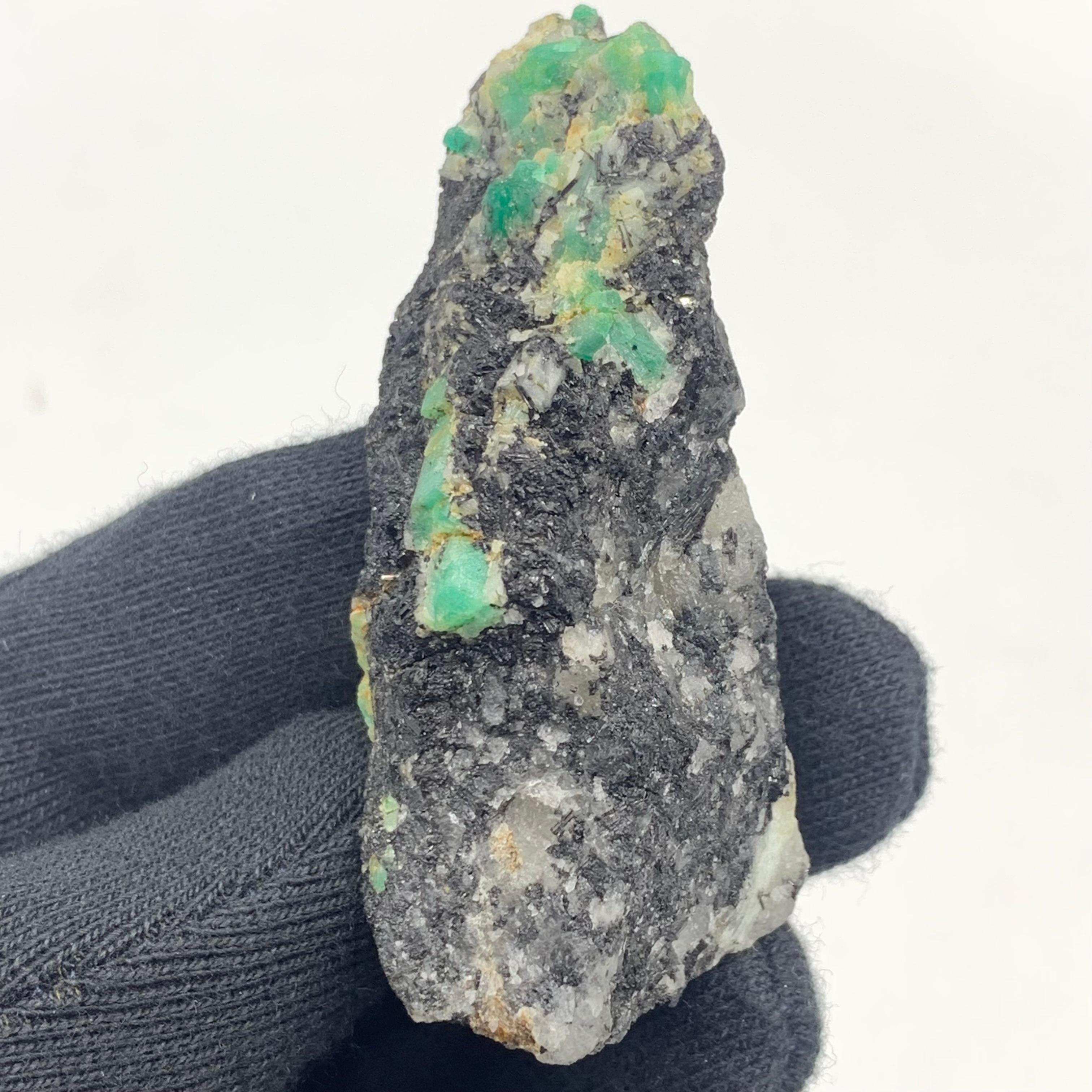 43.05 Gram Adorable Emerald Specimen From Chitral, Pakistan 
Weight: 43.05 Gram
Dimension: 6.8 x 2.6 x 2.3 Cm
Origin: Chitral, Khyber Pukhtunkhwa, Pakistan 

Emerald is a gemstone and a variety of the mineral beryl colored green by trace amounts of