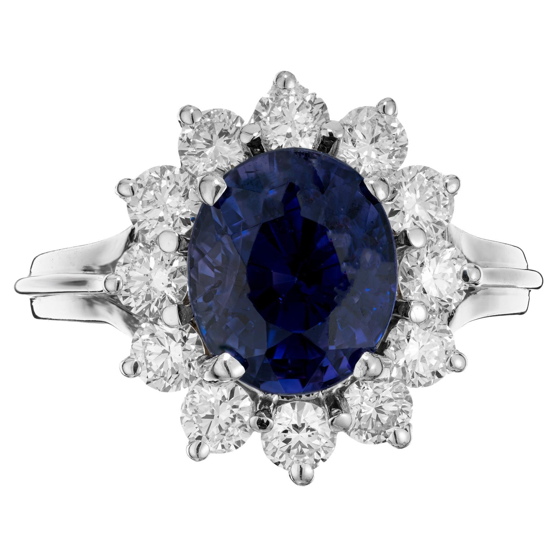 4.31 Carat Oval Sapphire Diamond Halo White Gold Mid-Century Engagement Ring For Sale