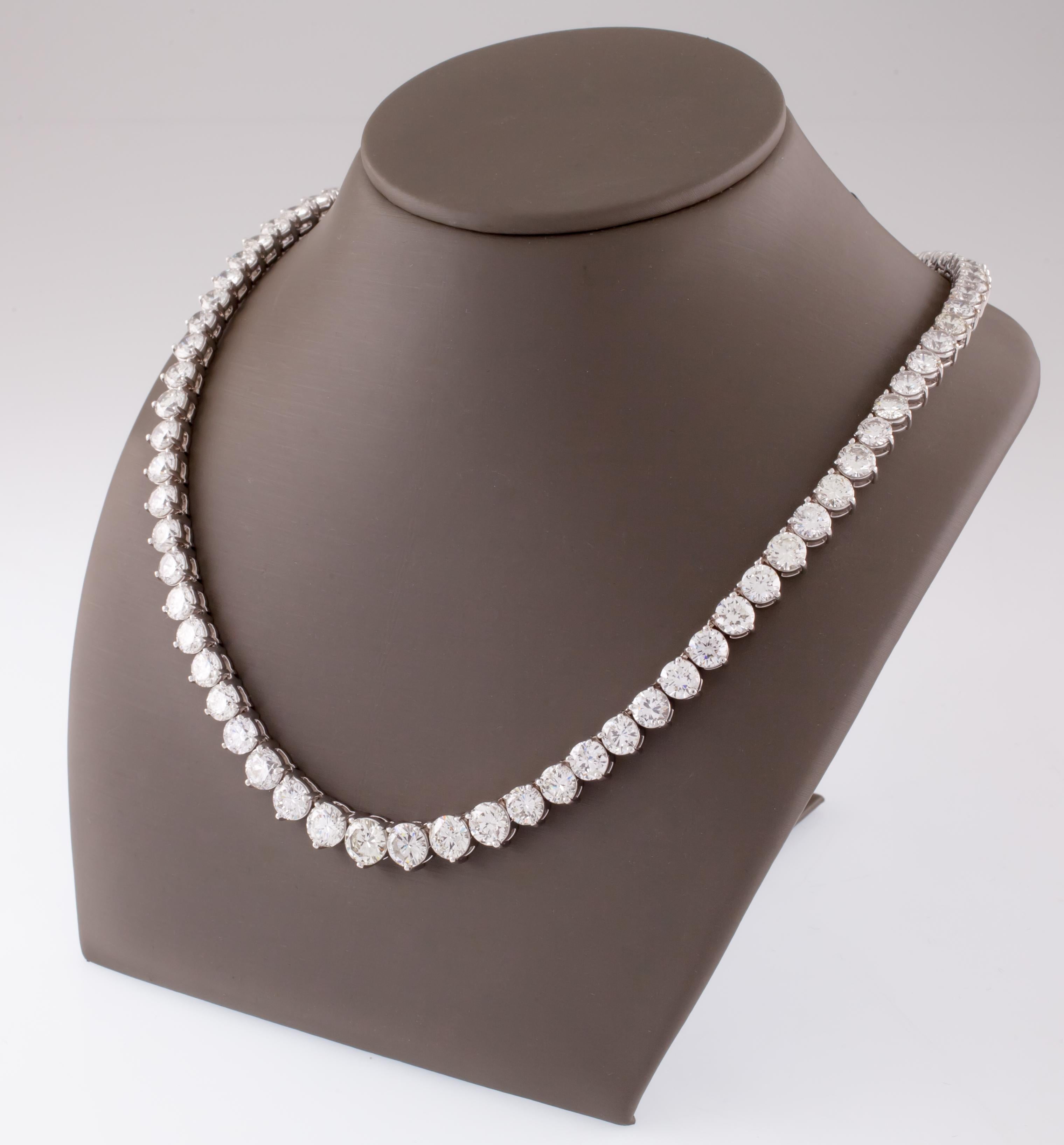 Gorgeous Tennis Necklace
3-Prong Settings for Each Stone
Stones in Graduated Series with Largest Stone in Center
Total Diamond Weight = 43.19 ct
Average Color = I - J
Average Clarity = VS - SI
Total Number of Stones = 81 stones
Total Length =
