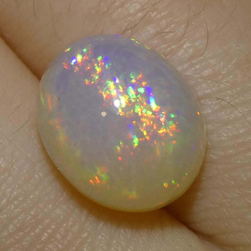 Women's or Men's 4.31ct Oval Cabochon White Crystal Opal from Ethiopia For Sale
