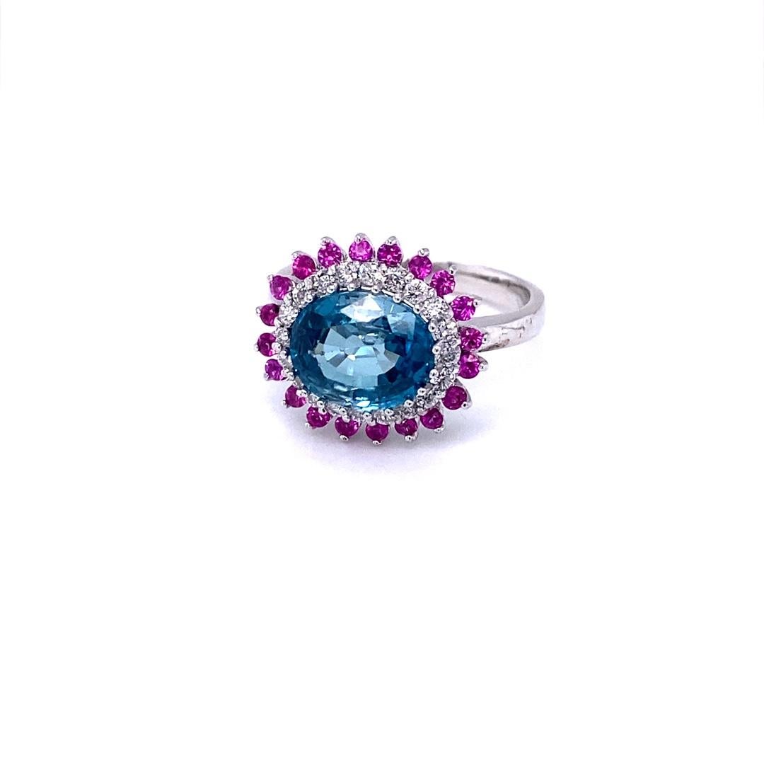 Ring aus Weißgold mit 4,32 Karat blauem Zirkon, Saphir und Diamant (Ovalschliff) im Angebot