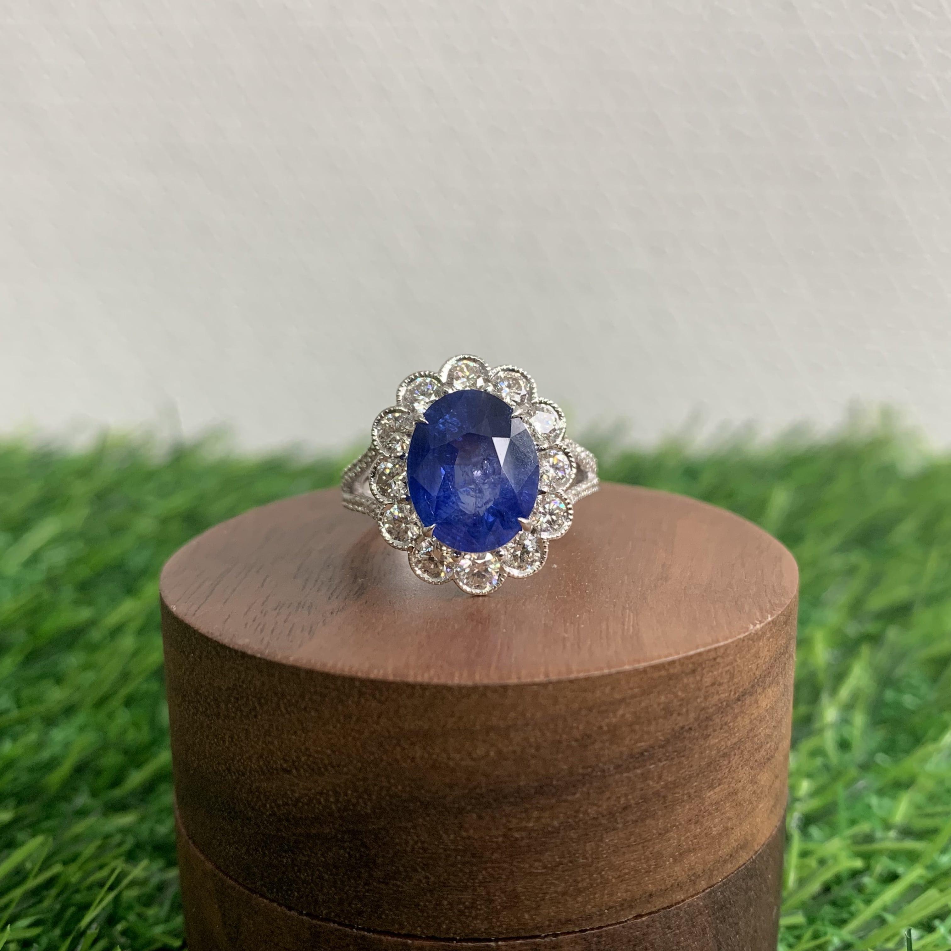 Radiating timeless elegance, this extraordinary piece has been specially designed to accentuate the mesmerizing beauty of this royal blue sapphire.

The sapphire, a regal emblem of rich sophistication, boasts a captivating royal blue hue and a total