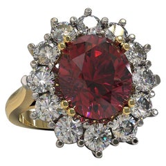4.32 Carat Oval Rhodolite and Diamonds Cocktail Ring in Platinum 
18 Carat Gold
