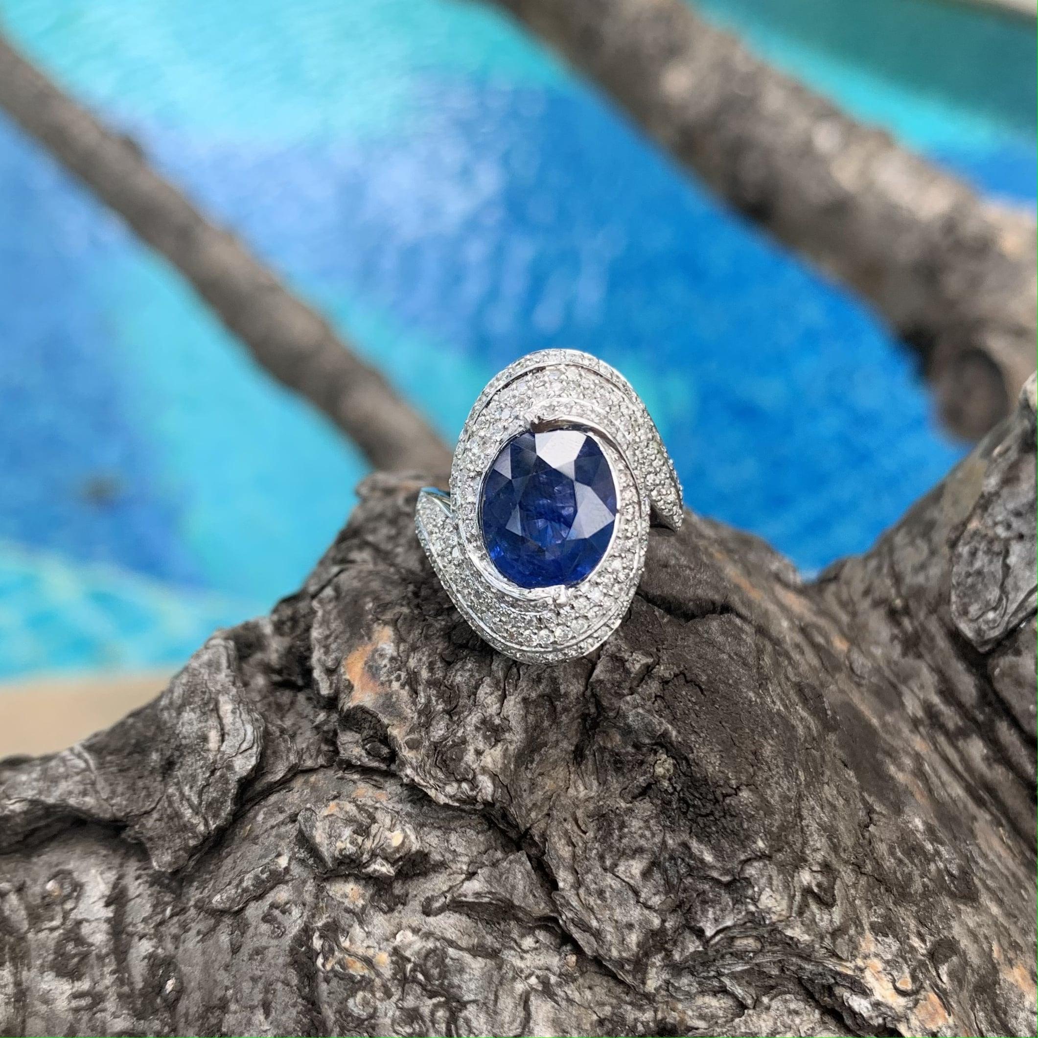 Introducing a one-of-a-kind masterpiece, the Enchanting Sapphire Statement Ring, a true embodiment of sophistication and allure. Prepare to be captivated by its striking design and luxurious features that command attention.

At the heart of this