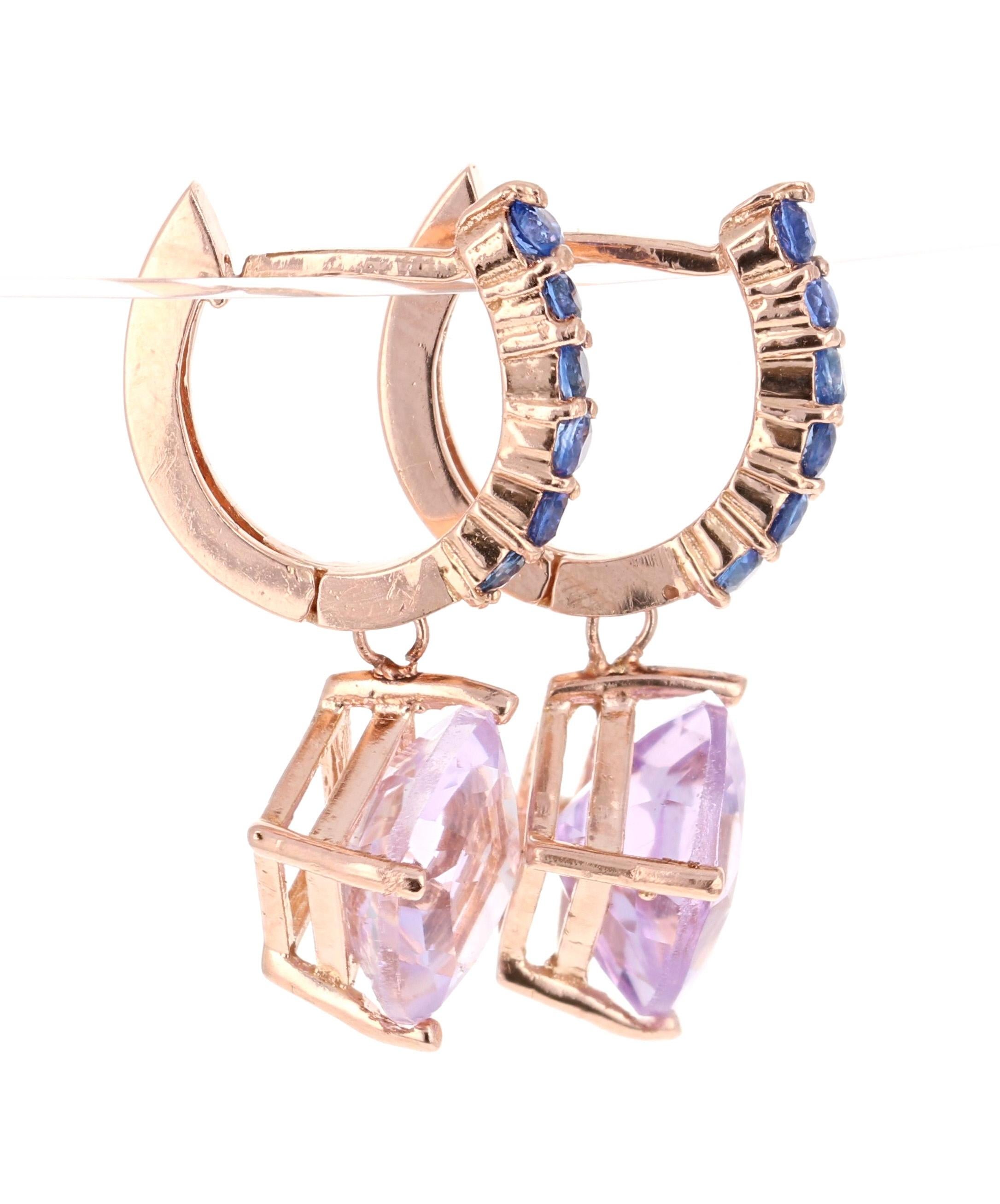 Amethyst and Blue Sapphire Drop Earrings! 

These stunning earrings have 2 Amethysts that weigh 3.80 Carats and are embellished with 12 Blue Sapphires that weigh 0.53 Carats. The total carat weight of the earrings are 4.33 Carats. 

They are