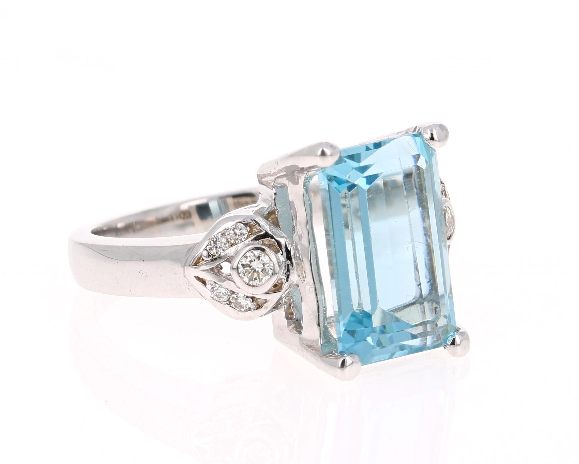 Stunning Aquamarine Ring! 

This ring has a beautiful 4.18 Carat Emerald Cut Aquamarine and is surrounded by 10 Round Cut Diamonds that weigh 0.15 carats (Clarity: VS2, Color: H). The total carat weight of this ring is 4.33 Carats. 
The ring is made