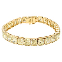 43,3 Karat Radiant Cut Fancy hellgelb GIA Diamant 18K YG Tennisarmband