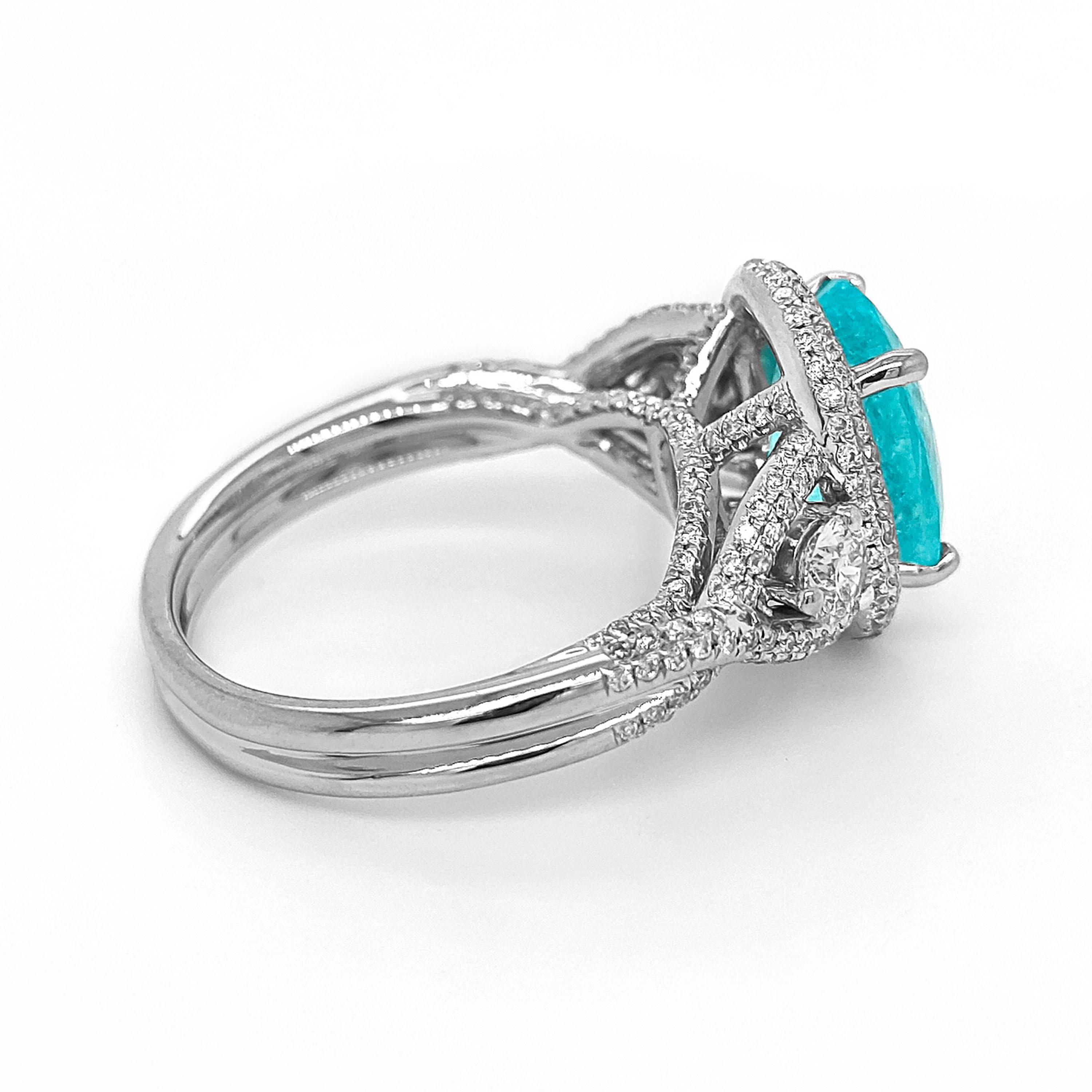 1 Tormalina Paraiba  Pietra preziosa: 3,36 carati
162 diamanti bianchi: 0,98 Carati
Metallo: Oro bianco 18 carati, 6,50 grammi
