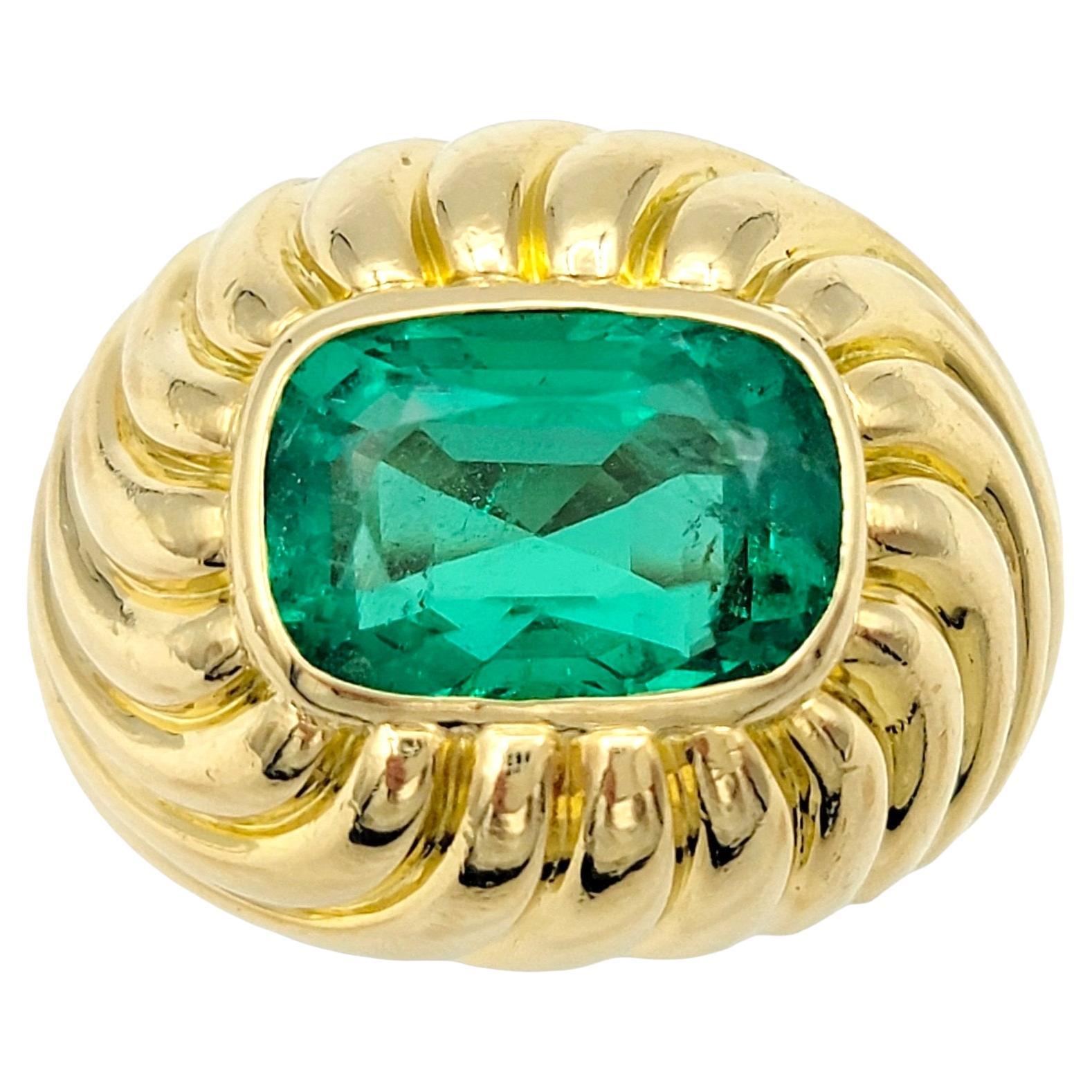 4.35 Carat Cushion Cut Emerald Solitaire Ridged Dome Ring 18 Karat Yellow Gold For Sale