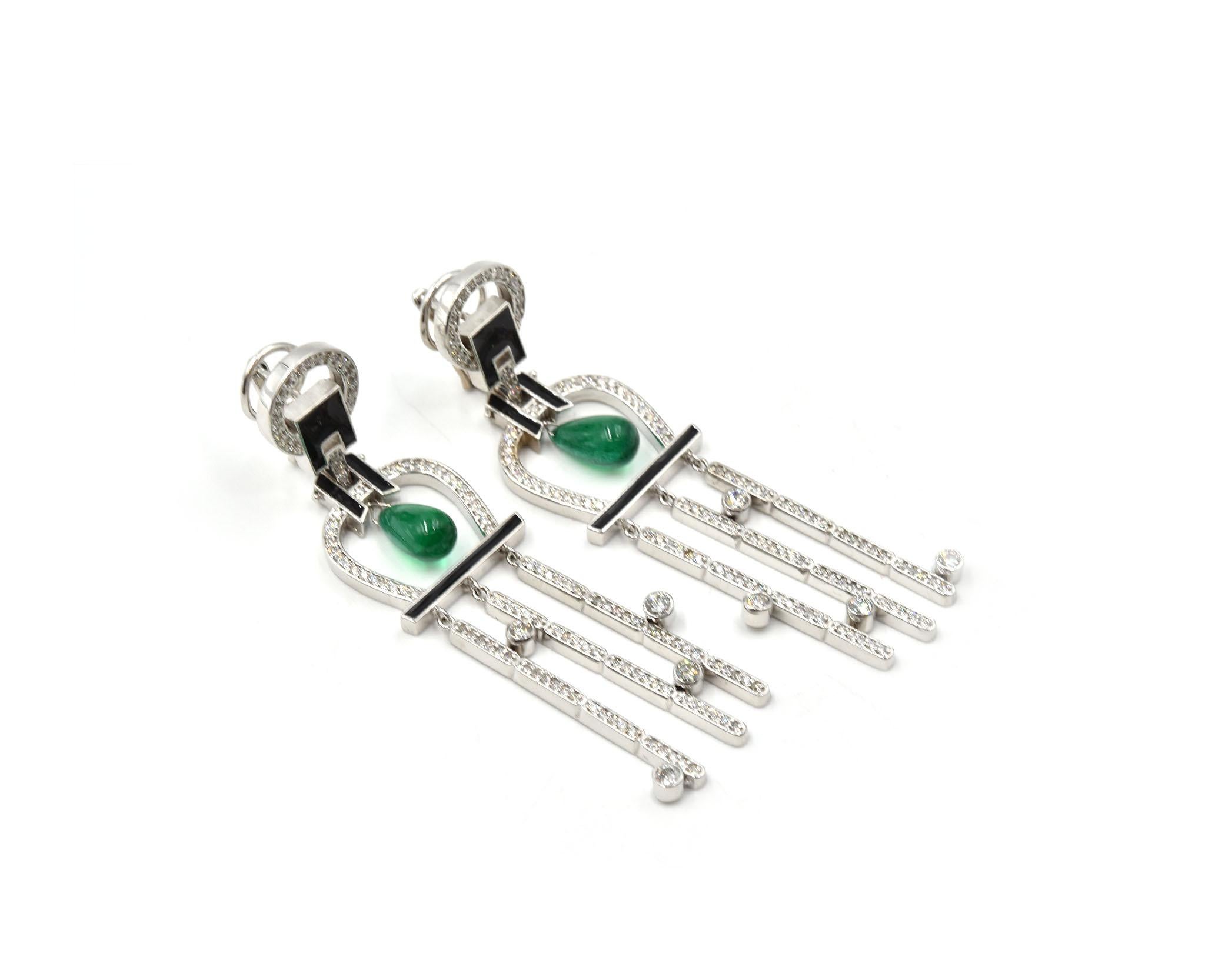 Designer: custom design
Material: 18k white gold
Emerald: two briolette cut emeralds = 4.35 carat weight
Diamonds: 244 round brilliant cut = 2.46 carat weight
Color: G-H
Clarity: SI1-SI2
Fastenings: omega backs
Dimensions: each earring is 2-inch