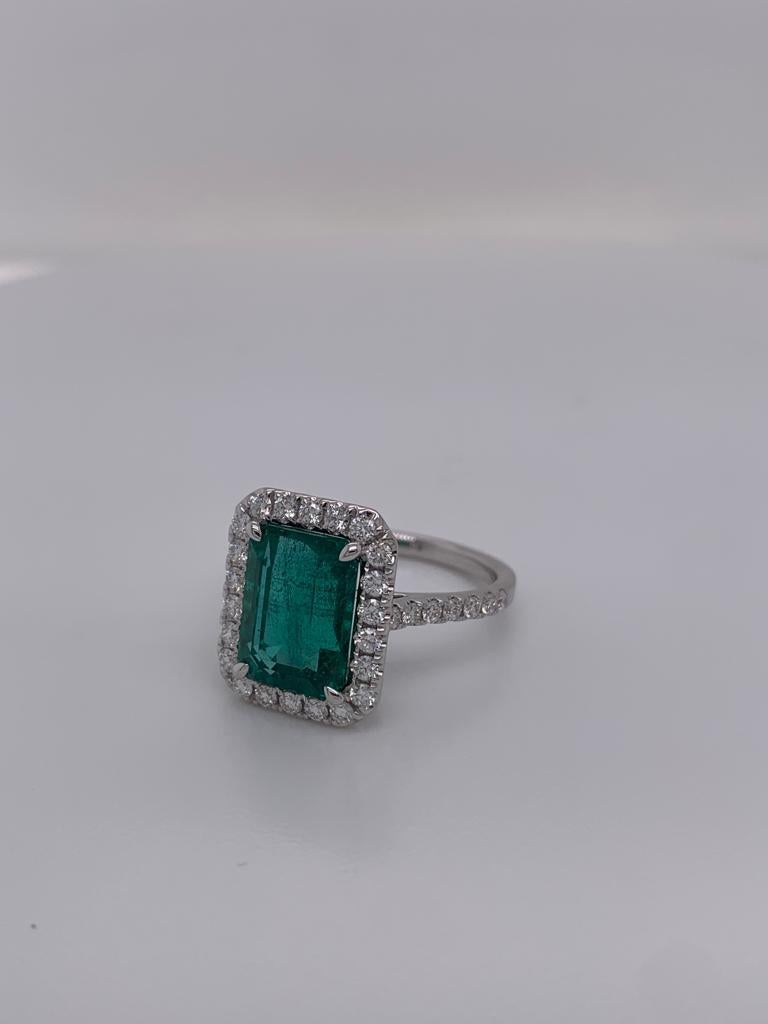 Modern 4.35 Carat Emerald Cut Emerald & Diamond Ring in 18 Karat White Gold For Sale