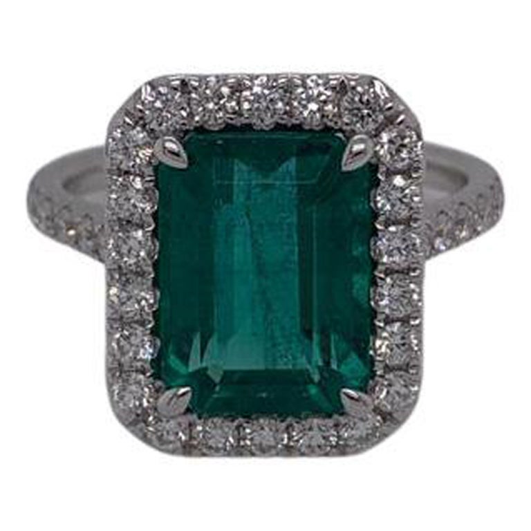 4.35 Carat Emerald Cut Emerald 
Diamond Ring in 18 Karat White Gold