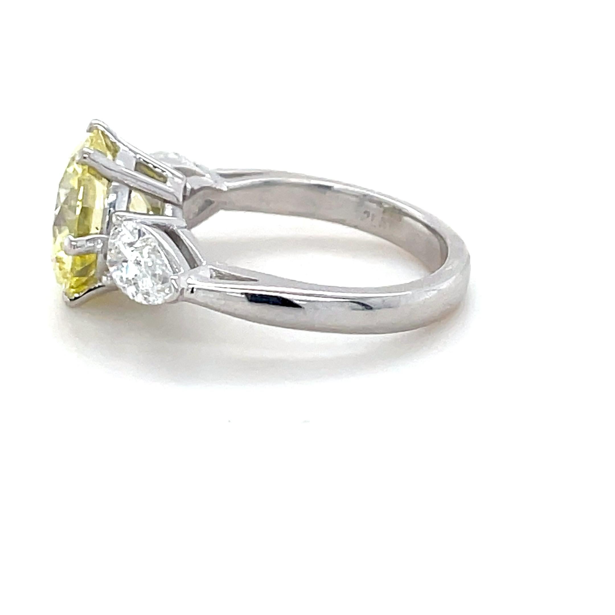 Women's 4.35 Carat Natural Fancy Yellow Diamond and Diamond Ring For Sale