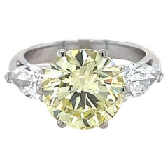 4.35 Carat Natural Fancy Yellow Diamond and Diamond Ring