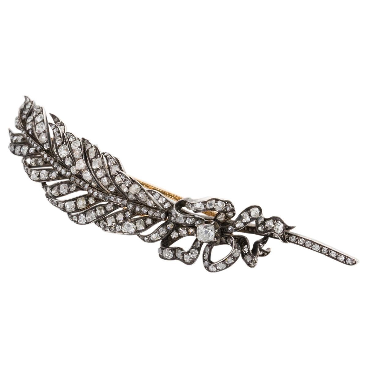 Circa 1895 - A stunning antique feather pin that is reminiscent of times gone by, it is a jewel that looks like it should be in a museum it's that beautiful and displays superb craftsmanship. Let's start with the 4.35cts of old mine & rose cut
