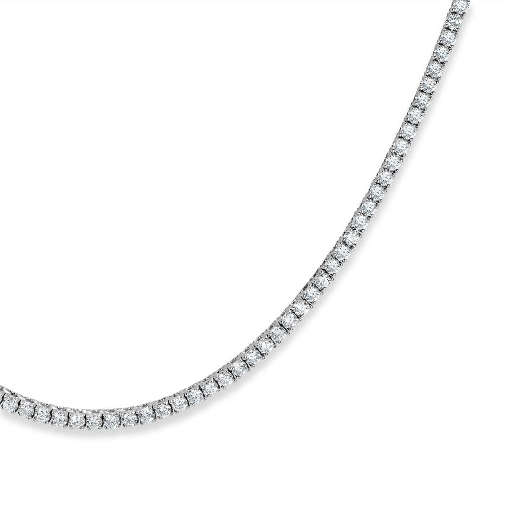 This ravishing diamond tennis necklace showcases 4.35ct of round brilliant cut diamonds hand set in a classic, 18k white gold setting. The diamonds are matched and graded at F-G colors, VS2-SI1 clarities.
