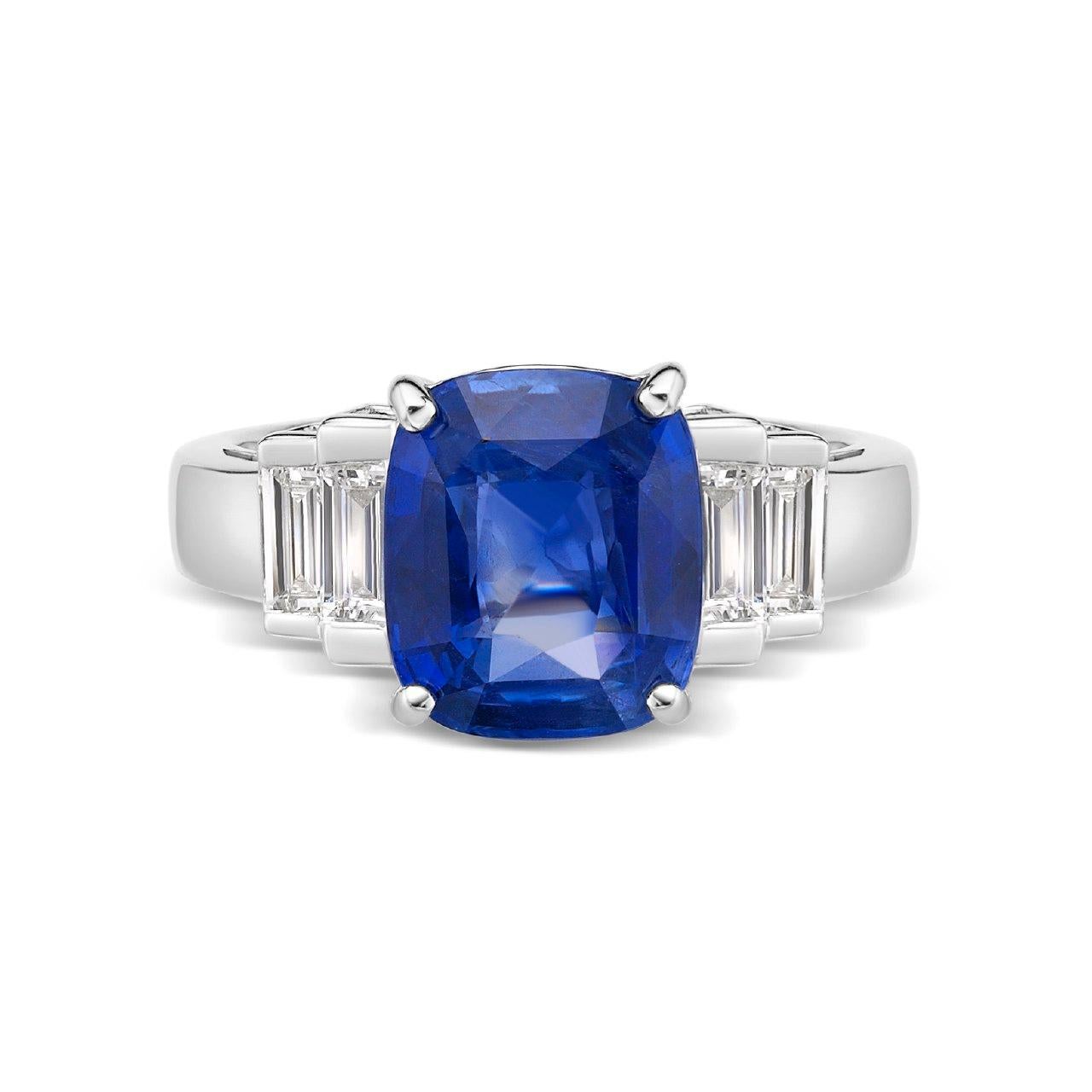 Primary Stone: Sapphire ( Sri Lanka )
Shape : Cushion Cut
Sapphire Weight: 4.35 Carats (1 Sapphire)
Measurements Sapphire: 9.85 mm x 8.40 mm x 5.25 mm
Color: Vivid Blue
Accent Stones: Genuine Diamond
Shape Or Cut Diamond: 4 Baguettes
Average