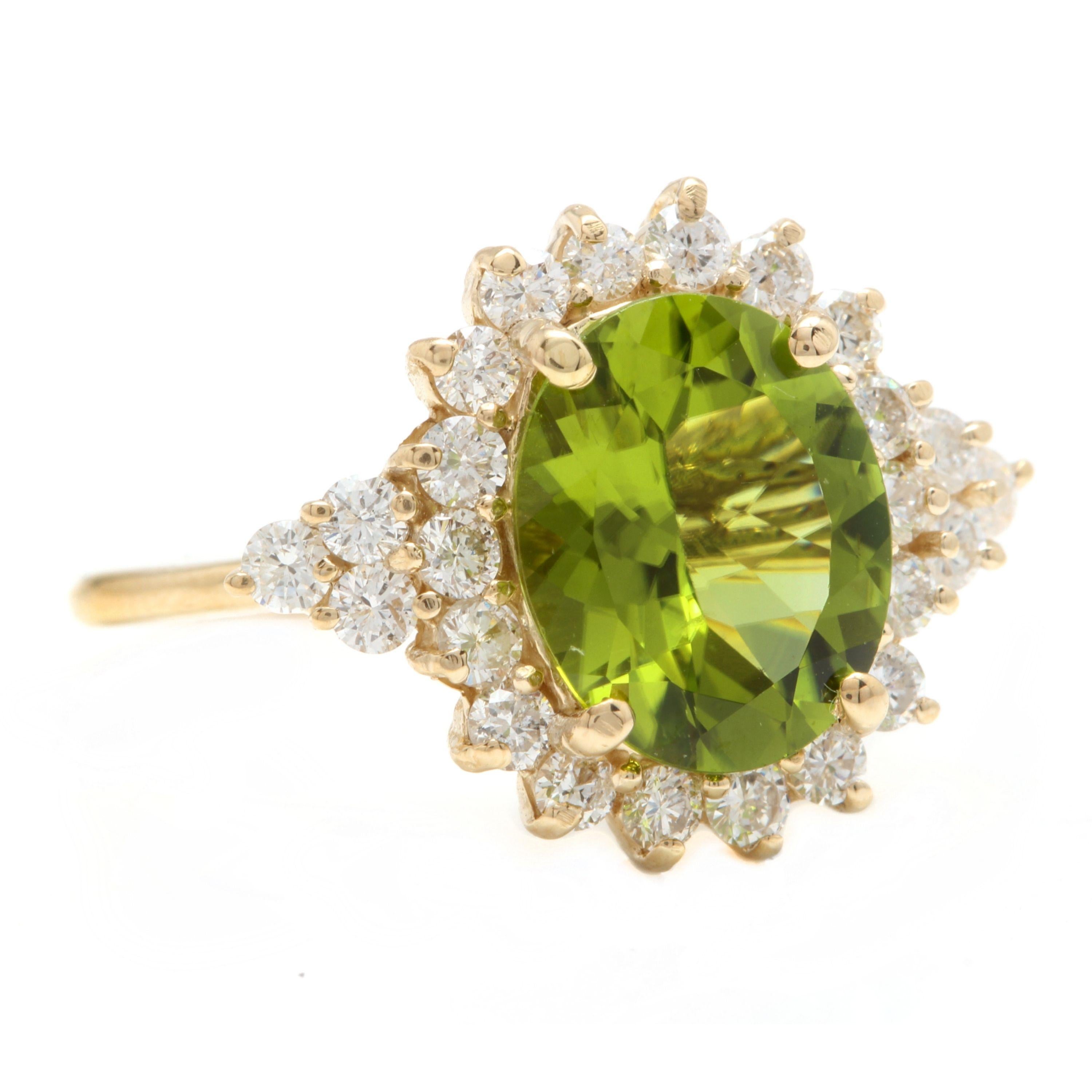 4.35 Carats Impressive Natural Peridot and Diamond 14K Yellow Gold Ring

Total Natural Peridot Weight is: Approx. 3.50 Carats

Peridot Measures: Approx. 11.00 x 9.00mm

Natural Round Diamonds Weight: Approx. 0.85 Carats (color G-H / Clarity