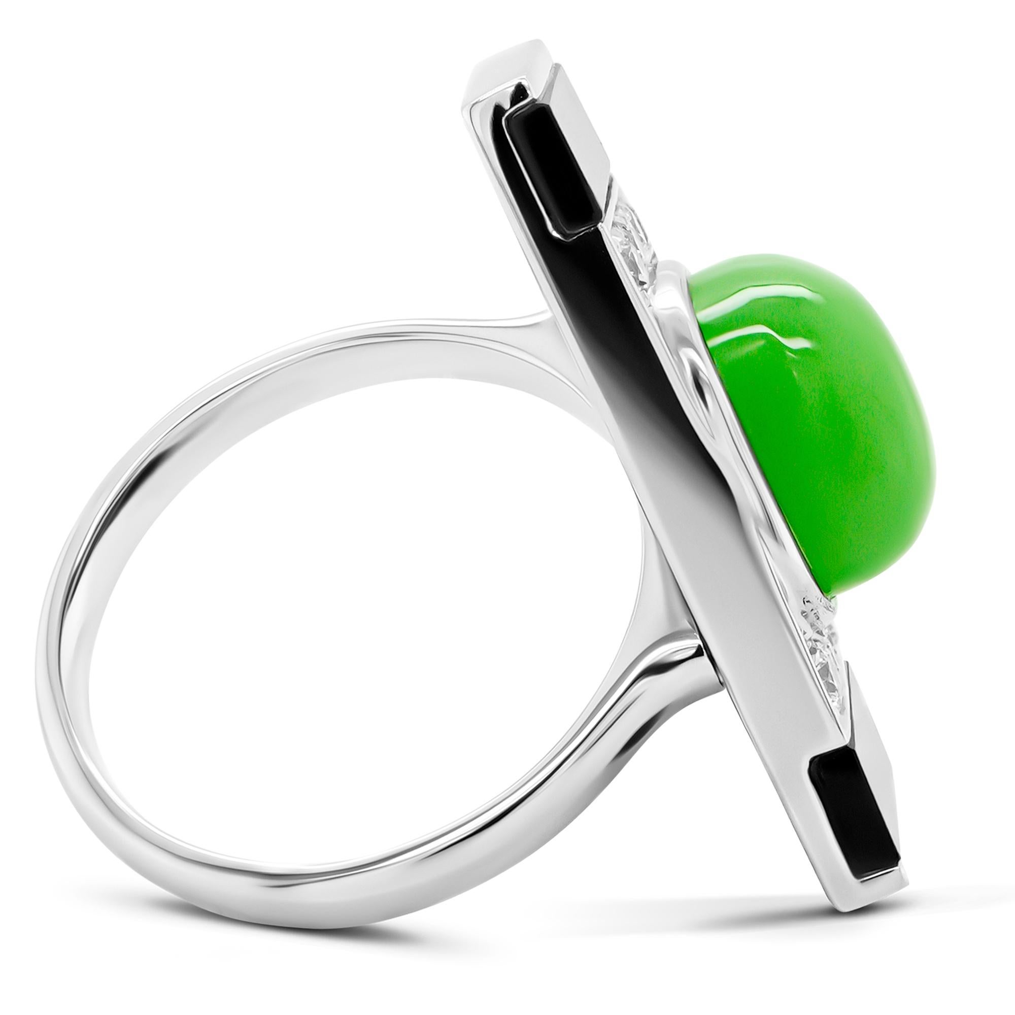Step back into the glamorous era of Art Deco with this striking 4.36-carat Chrysoprase and Onyx ring, set in 18K gold and accented with dazzling diamonds. A bold combination of geometric elegance and vibrant gemstones, this ring is a timeless