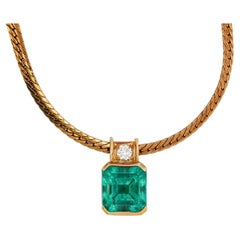 4.36 Carat Colombian Emerald Half Bezel 18K Gold Pendant Necklace