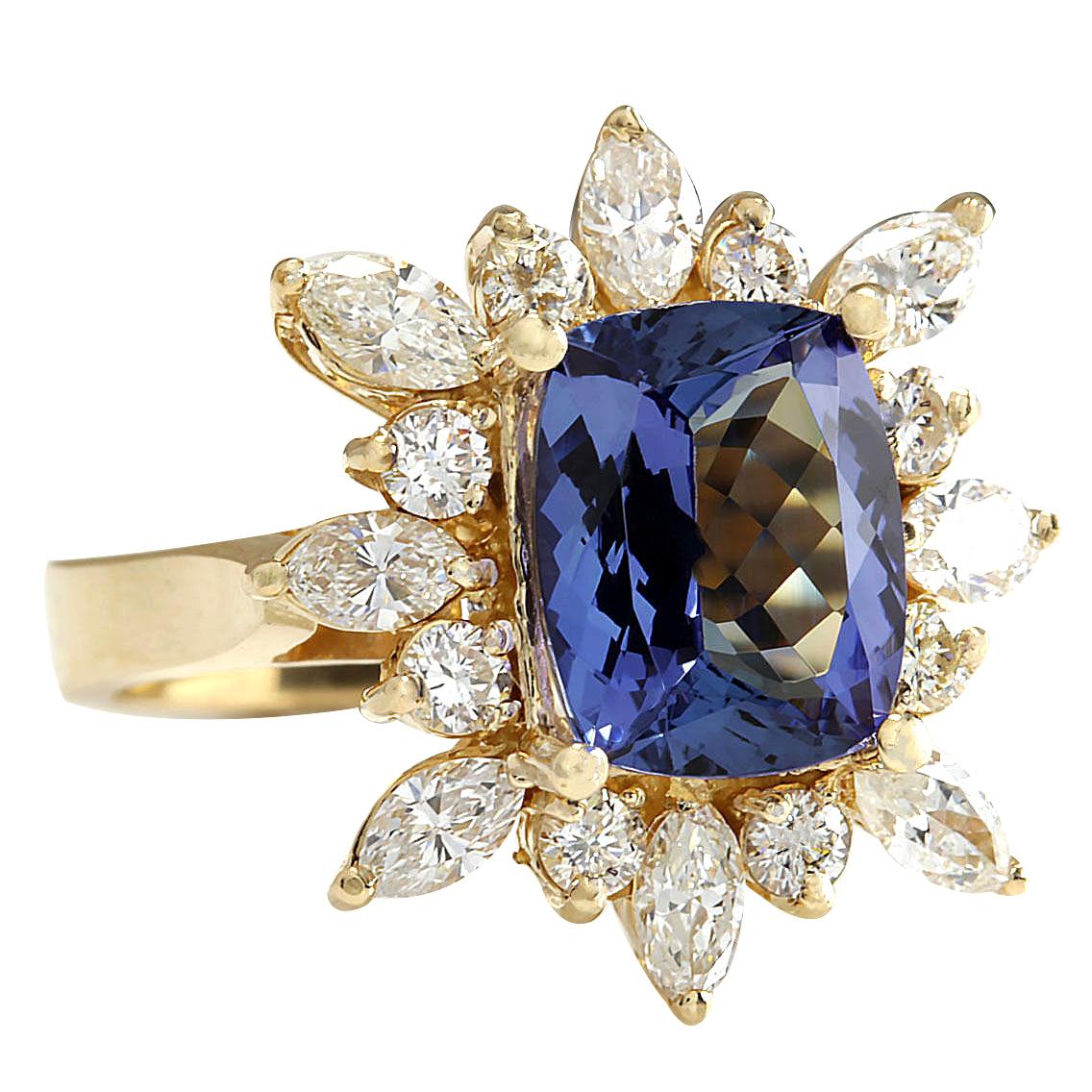 4.36 Carat Natural Tanzanite 14 Karat Yellow Gold Diamond Ring
Stamped: 14K Yellow Gold
Total Ring Weight: 7.2 Grams
Total Natural Tanzanite Weight is 2.86 Carat (Measures: 10.00x8.00 mm)
Color: Blue
Total Natural Diamond Weight is 1.50 Carat
Color:
