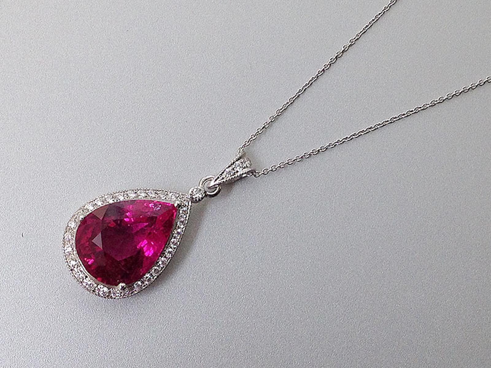 Vibrant bubblegum pink shades embody a sense of playfulness, simplicity, and pure joy. This 5.03 carats Rubellite pendant, elegantly set in 14K White Gold and encircled by perfectly matched diamonds, encapsulates all these lively elements. When you