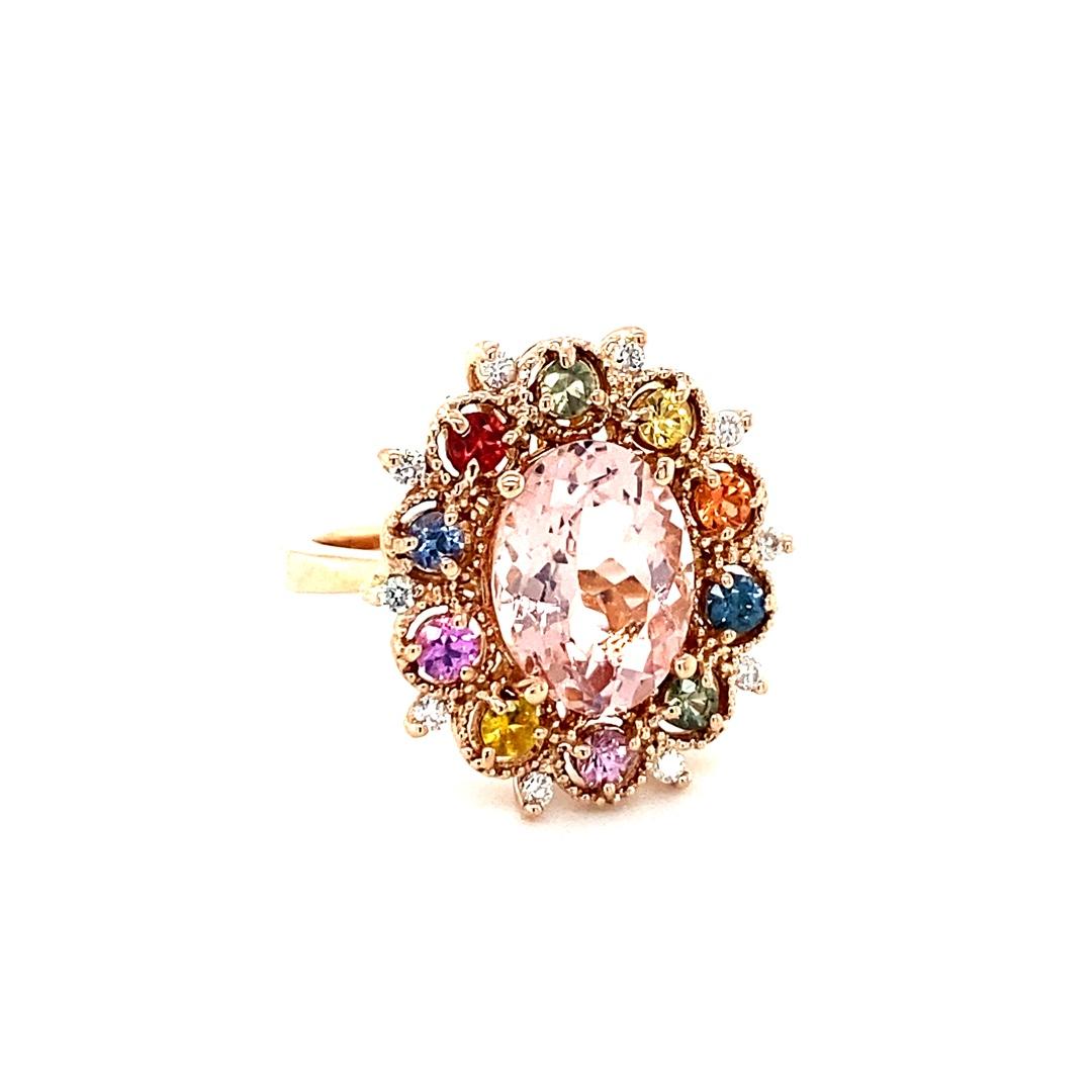 4.37 Carat Morganite Diamond Multi Color Sapphire Rose Gold Cocktail Ring 

Item Specs:

Natural Pink Morganite (Oval Cut) is 3.32 carats
10 Natural Multi-Color Sapphires (Round Cut) is 0.89 carats
10 Natural Diamonds (Round Brilliant Cut) is 0.16