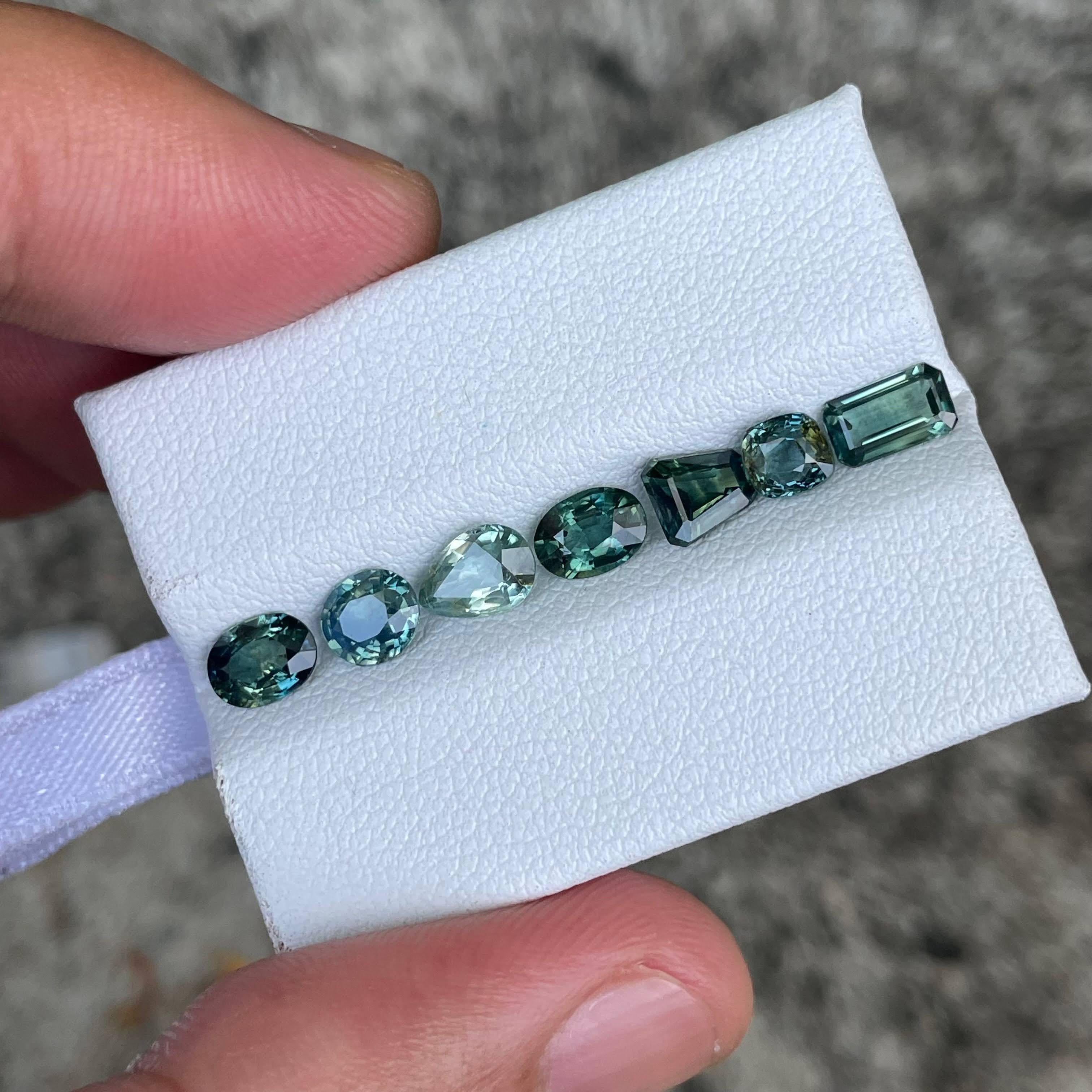Modern 4.37 Carats Teal Sapphire Stones 7 Pieces Gemstones Lot from Madagascar For Sale