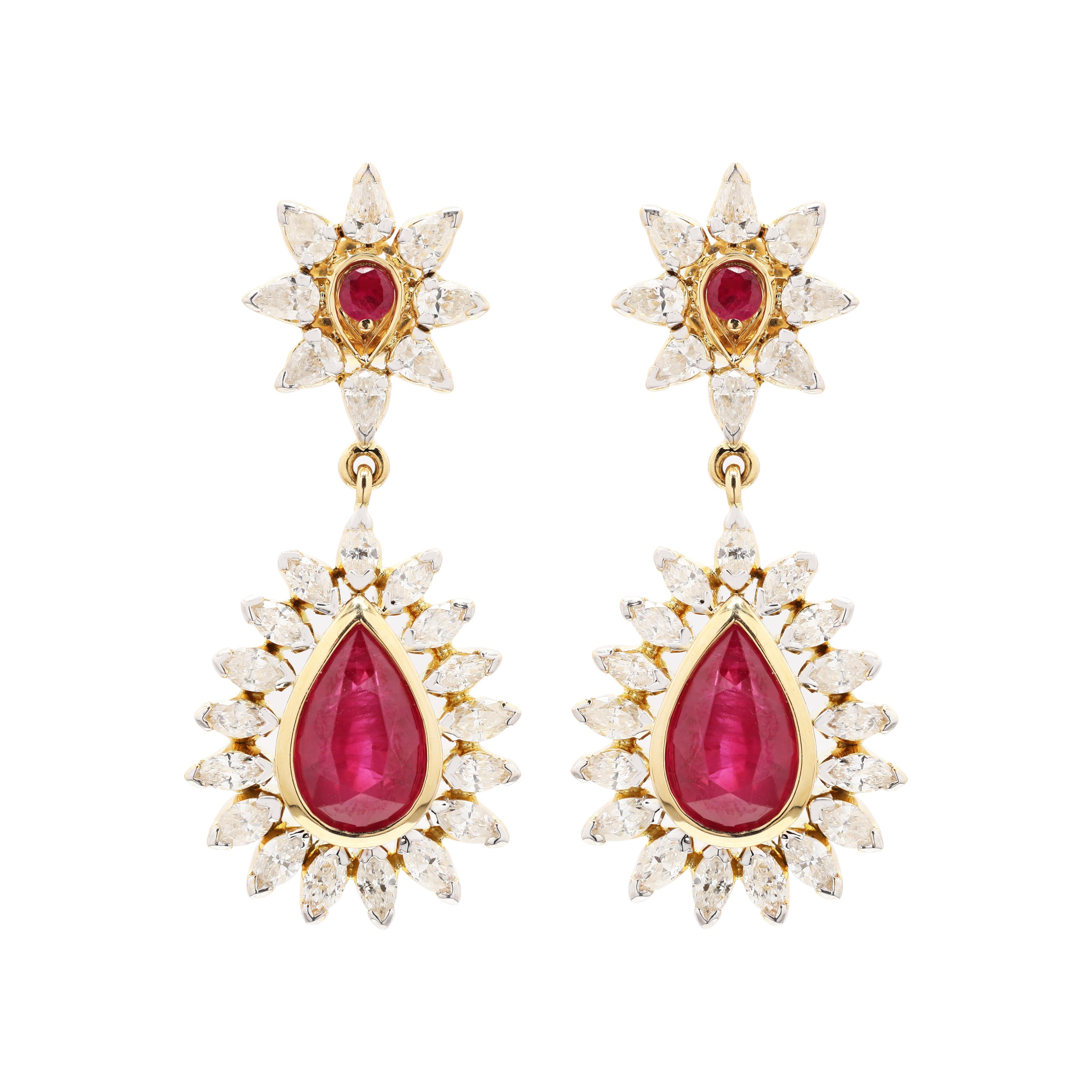 Diamond Ruby Wedding Dangle Earrings in 18K Gold with Diamonds to make a statement with your look. These earrings create a sparkling, luxurious look featuring oval cut gemstone.
If you love to gravitate towards unique styles, this piece of jewelry