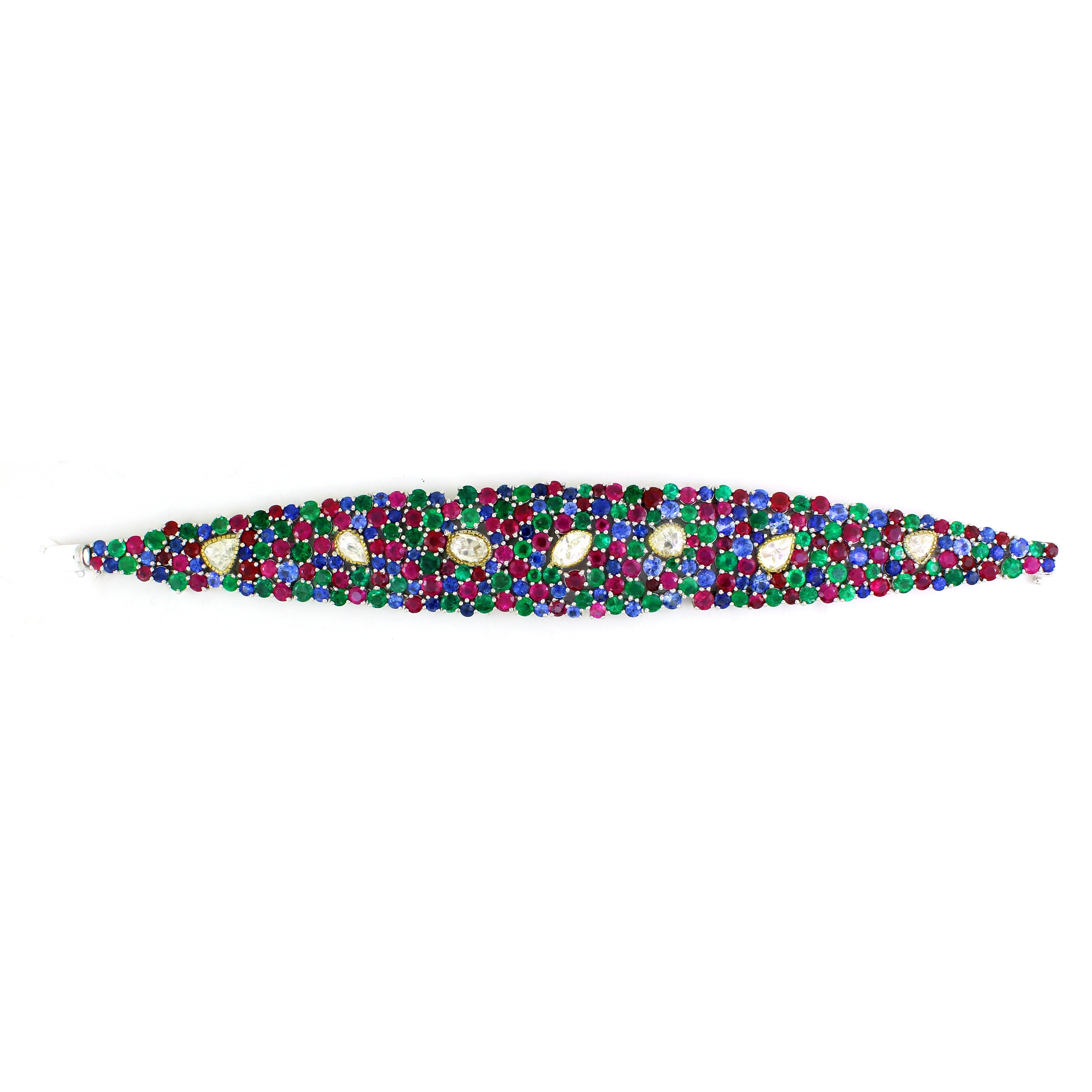 Modern 43.71 cts of Emerald, Ruby and Sapphire Bracelet For Sale