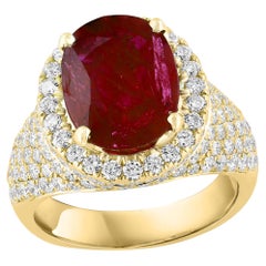 4.38 Carat Oval Cut Ruby and Diamond Fashion Ring in 18K Yellow Gold