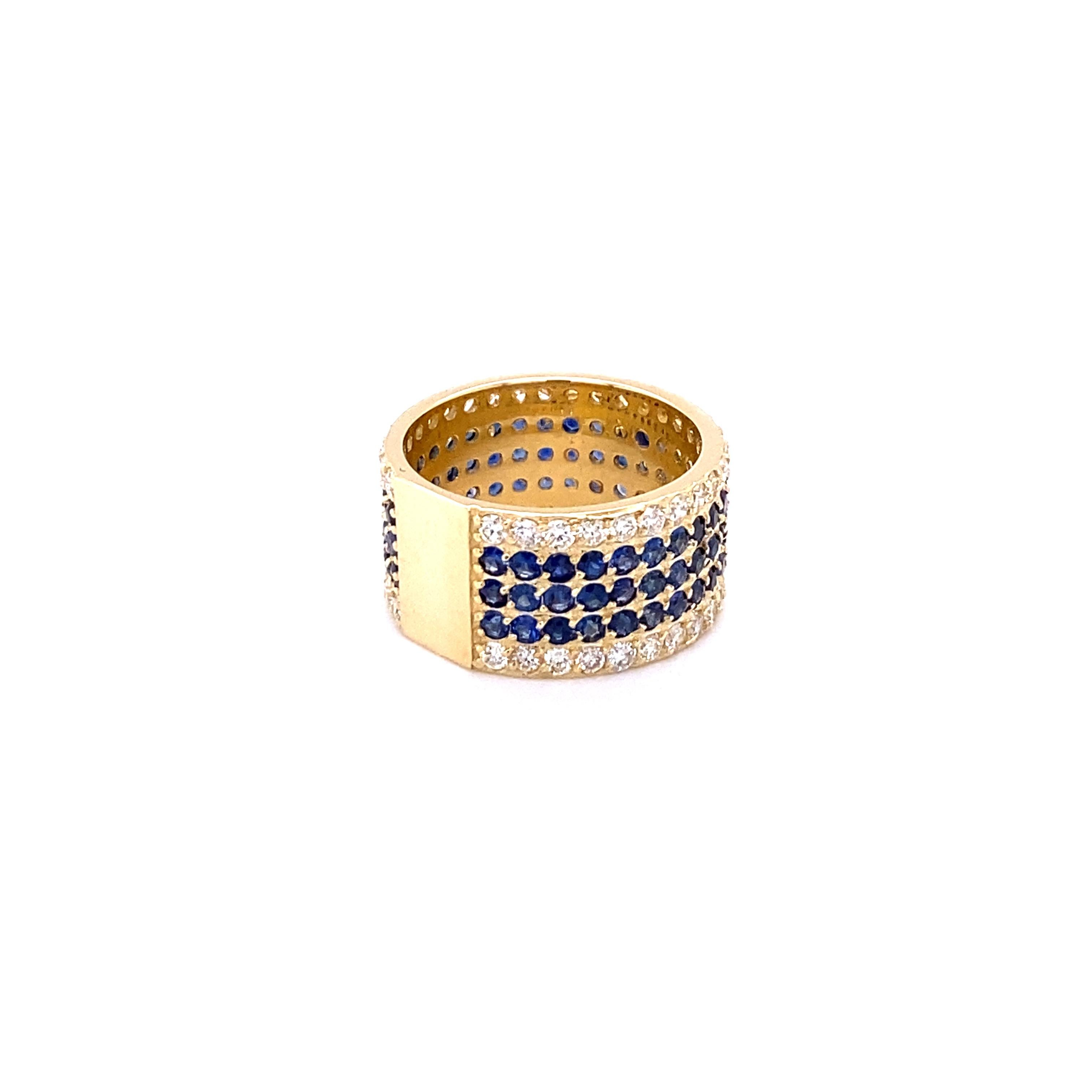 This ring has 90 Blue Sapphires that weigh 2.90 Carats and 60 Round Cut Diamonds that weigh 1.48 Carats. The clarity and color of the diamonds are VS-H. The total carat weight of the ring is 4.38 Carats. 

Crafted in 14 Karat Yellow Gold and is