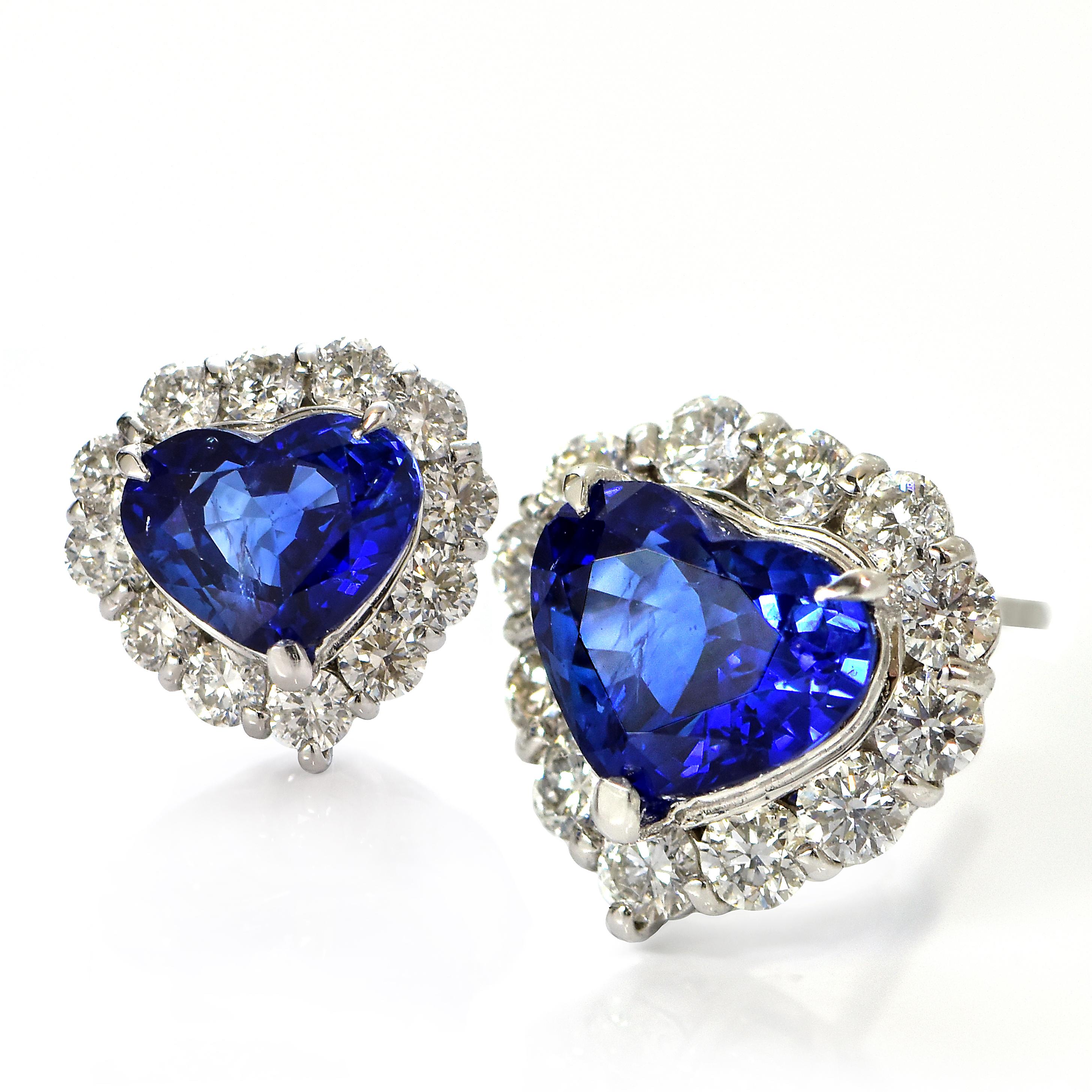 A beautiful pair of earrings featuring a total of 4.38 Carat Natural Royal Blue Sapphires and 1.22 Carats Diamond Accents made in Platinum. Sapphires have extraordinary durability - they excel in hardness as well as toughness and durability making