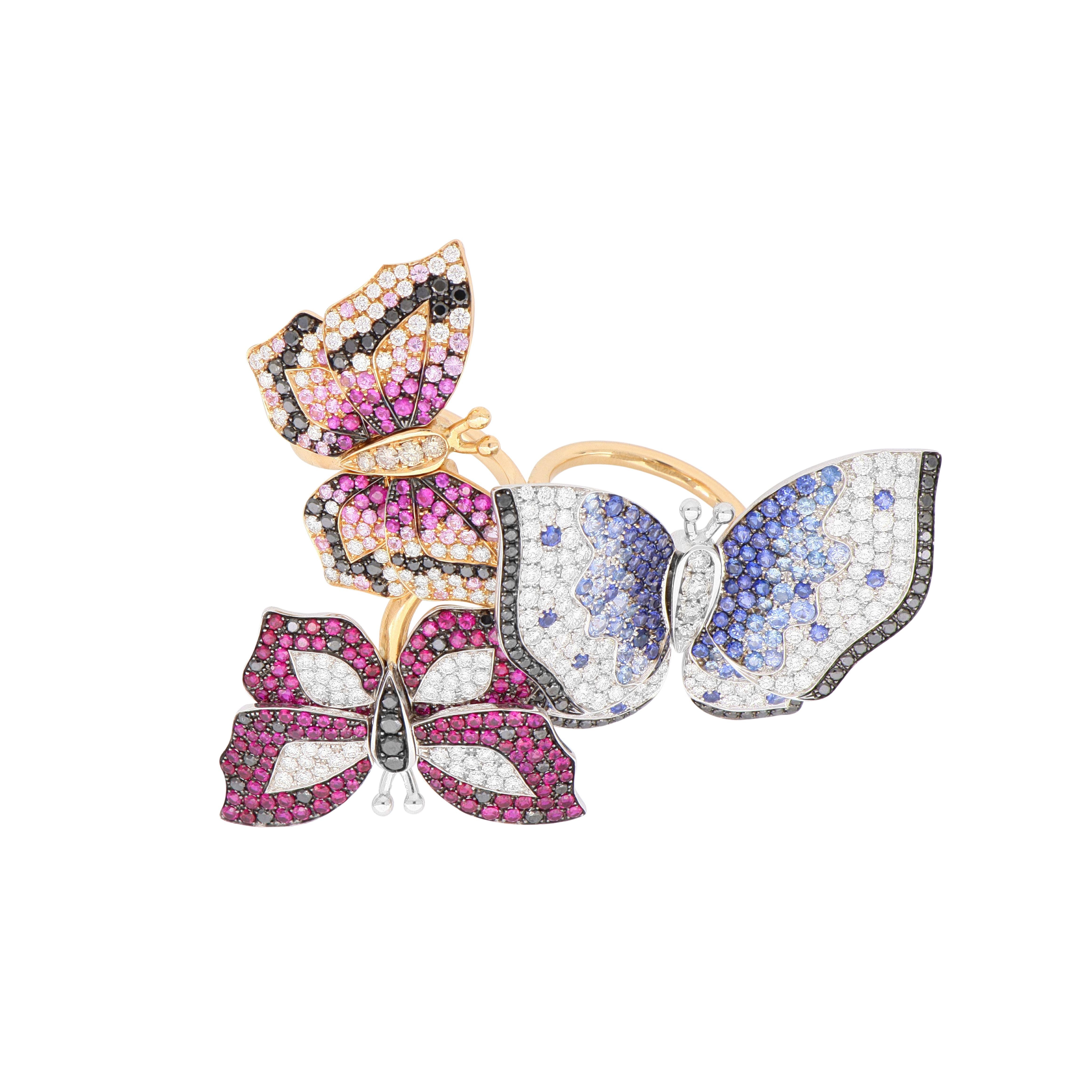 This is the right ring to choose if you're after a spectacular, jaw-dropping effect that will be remembered. Crafted in 18 Kt yellow gold, this fashion ring features 3 butterflies that are completely covered in different-shade rubies, sapphires, and