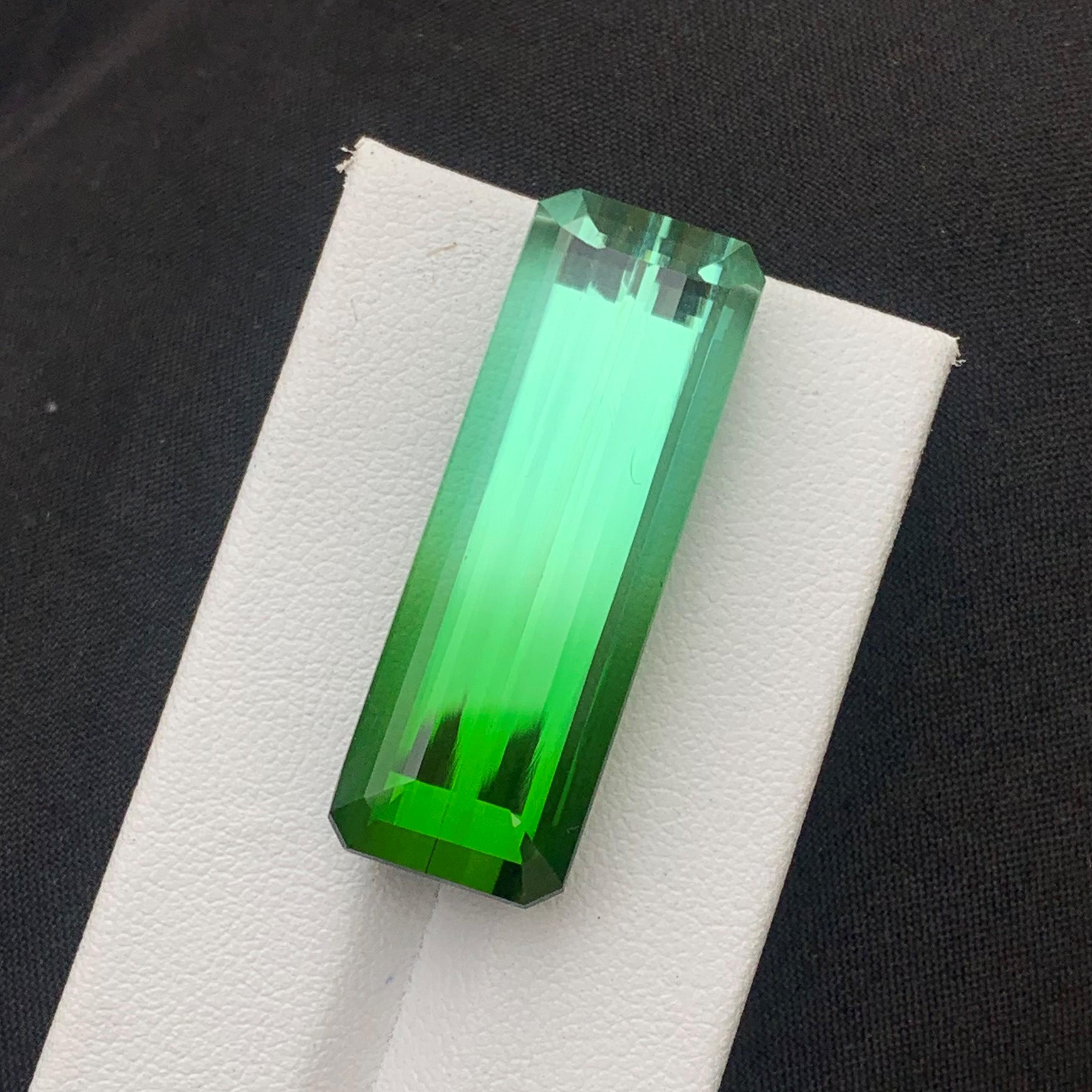 Faceted Bicolor Tourmaline
Weight: 43.87 Carats
Dimension: 34.75x12.10x10.69 Mm
Origin: Afghanistan
Color: Bluish green & Seafoam Green
Shape: Emerald Cut
Quality: AAA 
Certificate: Available
.
Bicolor tourmaline is connected to the heart chakra,