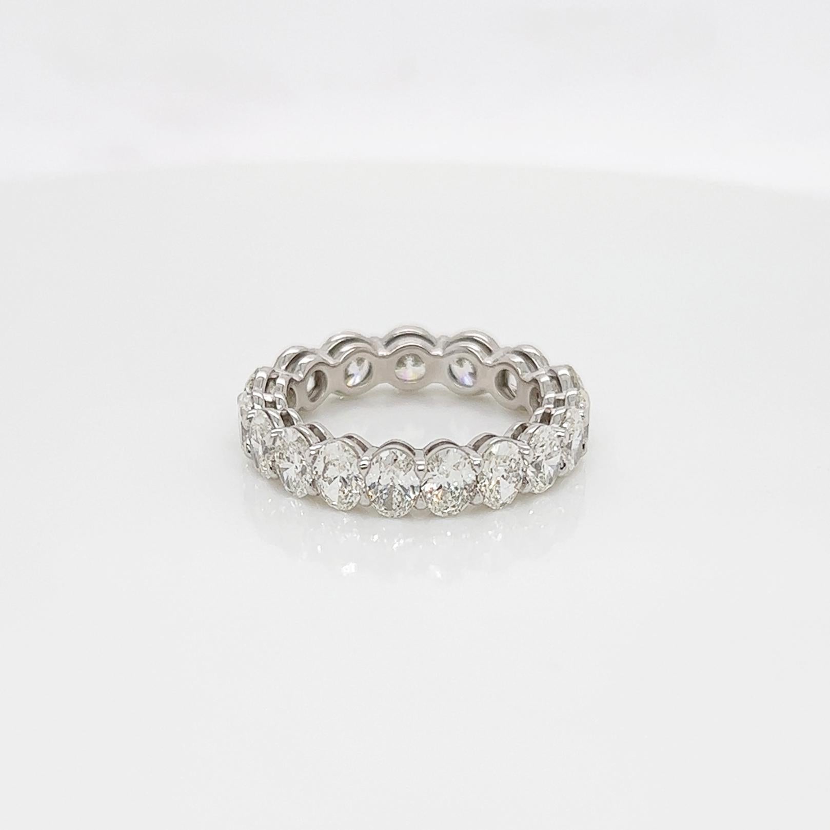 Ladies diamond mixed shape Eternity band carries 4.38ct of oval and round diamonds placed in platinum.

Size: 6.0
Color: F-G
Clarity: VS

This shared prong style Eternity band was handmade by our jewelers in New York City.