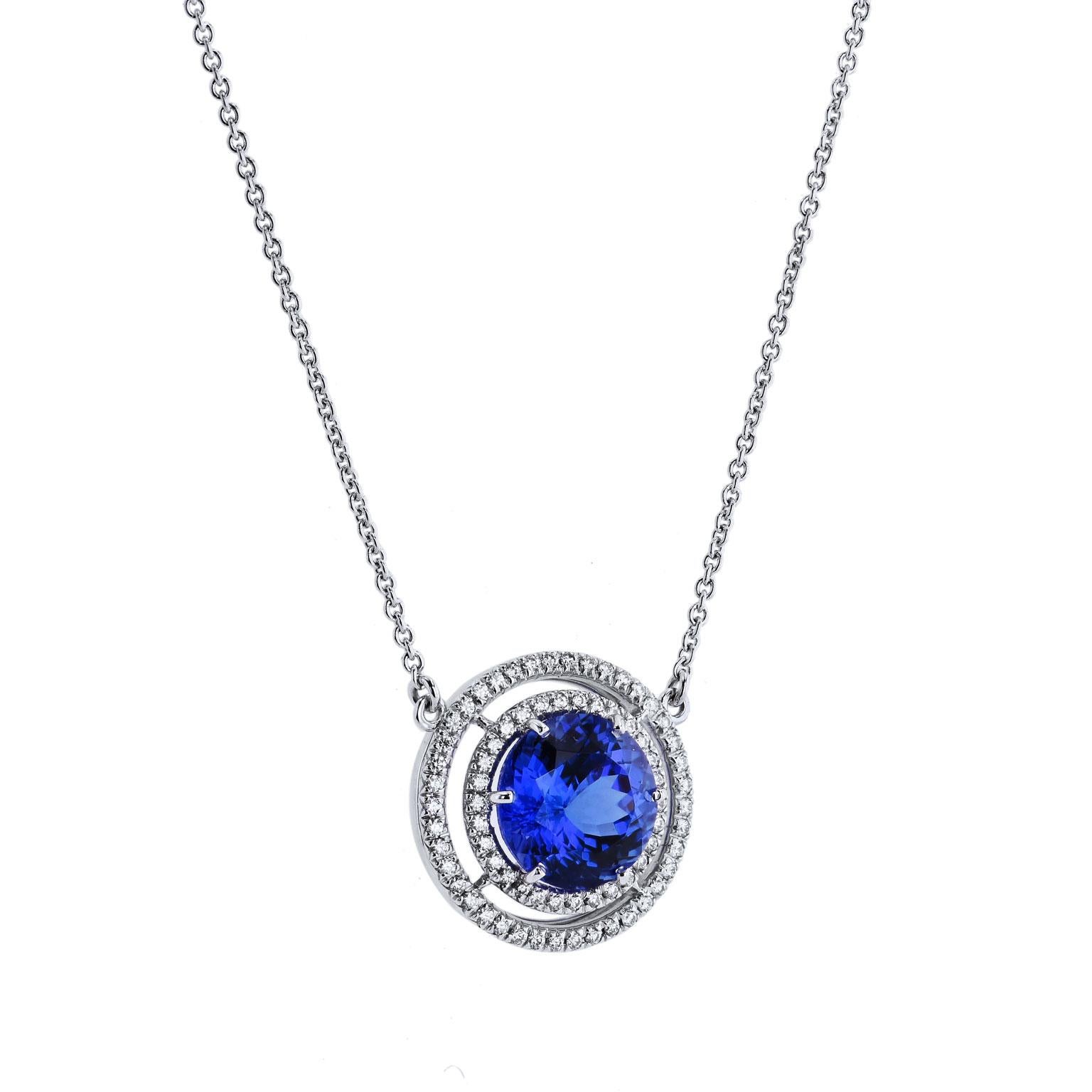 H&H 4.39 Carat Tanzanite Pave Diamond Double Halo Pendant Necklace

This is a one of a kind, handmade piece by H&H Jewels.  
It features a 14.39 carat Tanzanite and a double halo made up of 0.32ct I/J VS1 Pave Diamonds.

It is a truly stunning