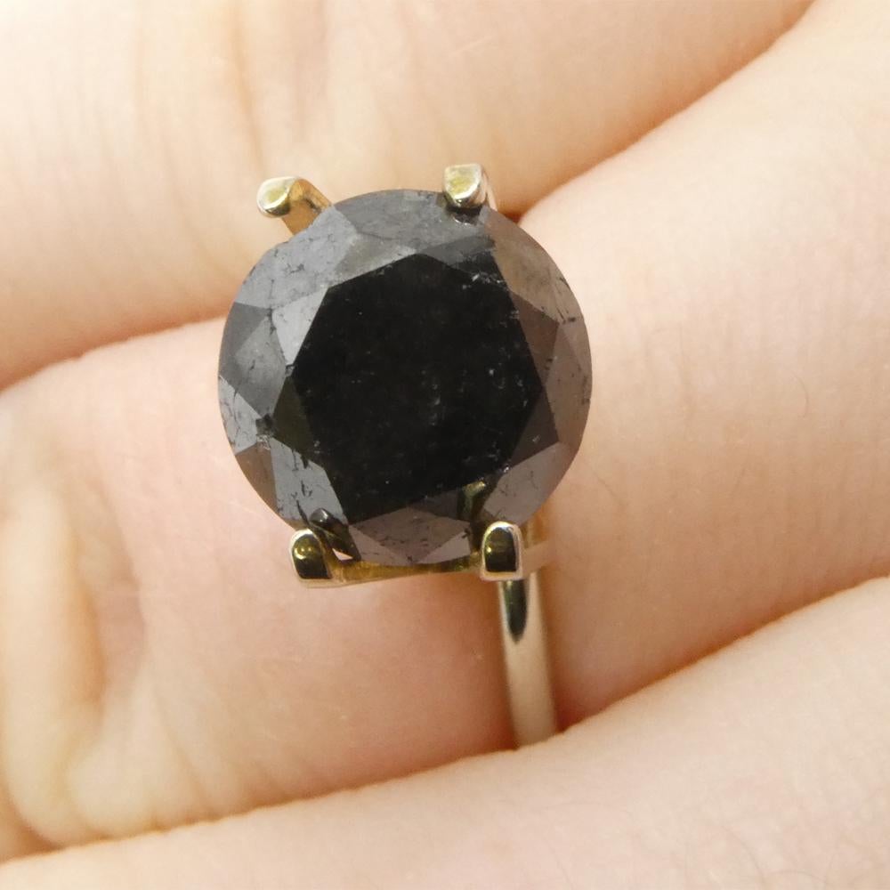 Description:

Gem Type: Diamond 
Number of Stones: 1
Weight: 4.3 cts
Measurements: 9.46 x 9.46 x 6.87 mm
Shape: Round
Cutting Style Crown: Brilliant Cut
Cutting Style Pavilion: Brilliant Cut 
Transparency: Opaque
Clarity: N/A
Colour: Black
Hue: