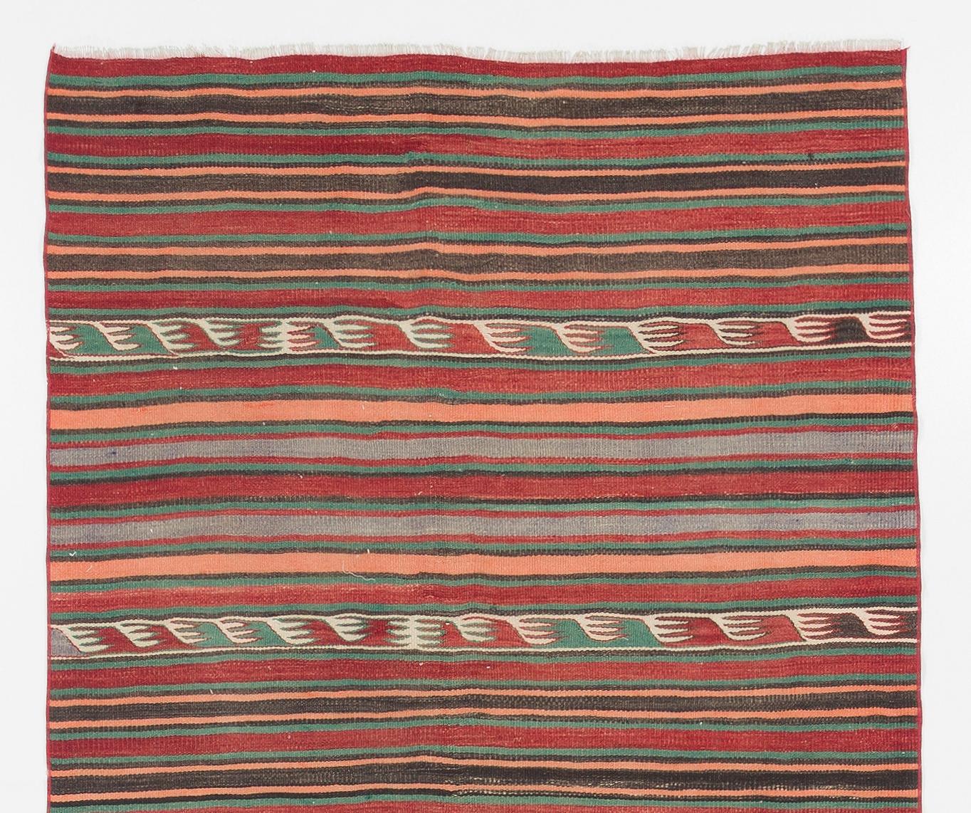 Vintage handwoven flat-weave (Kilim) with striped design, 100% wool. Size: 4.3 x 11.4 Ft.
Reversible; both sides can be used.
Ideal for both residential and commercial interiors.
We can supply a suitable rug-pad if requested for extra cushioning and